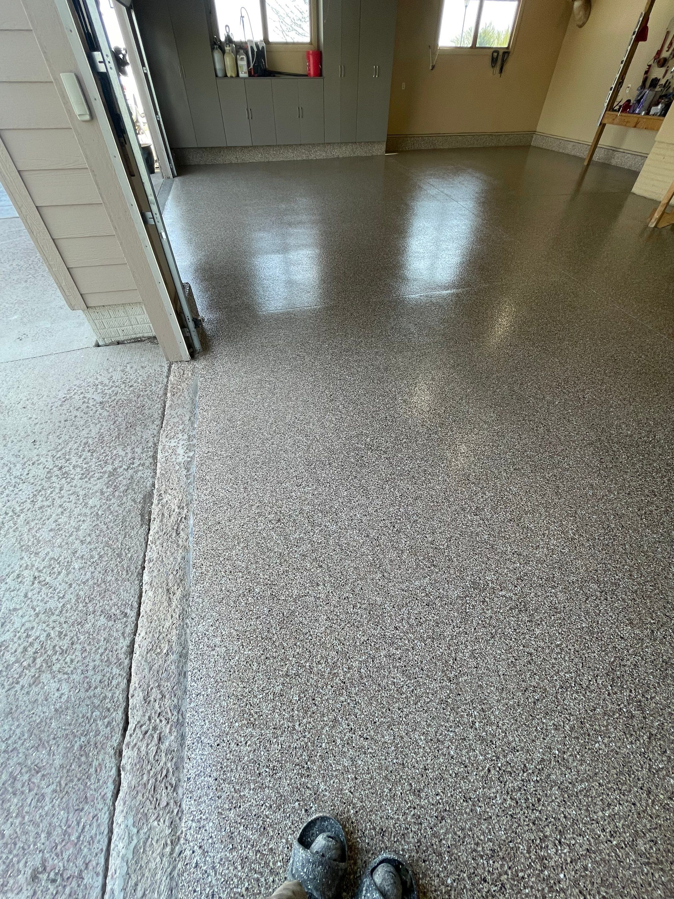 Residential Garage Floor Transformation with Speckled Epoxy Coating by Select Painting, Coatings & Garage Cabinets