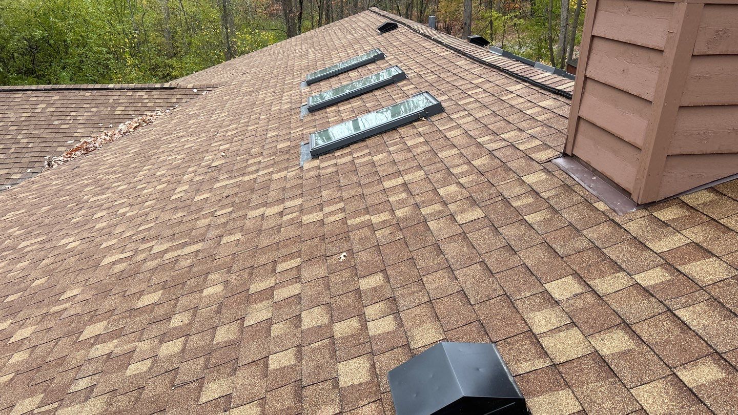 Asphalt Roof Replacement by Custom Installations