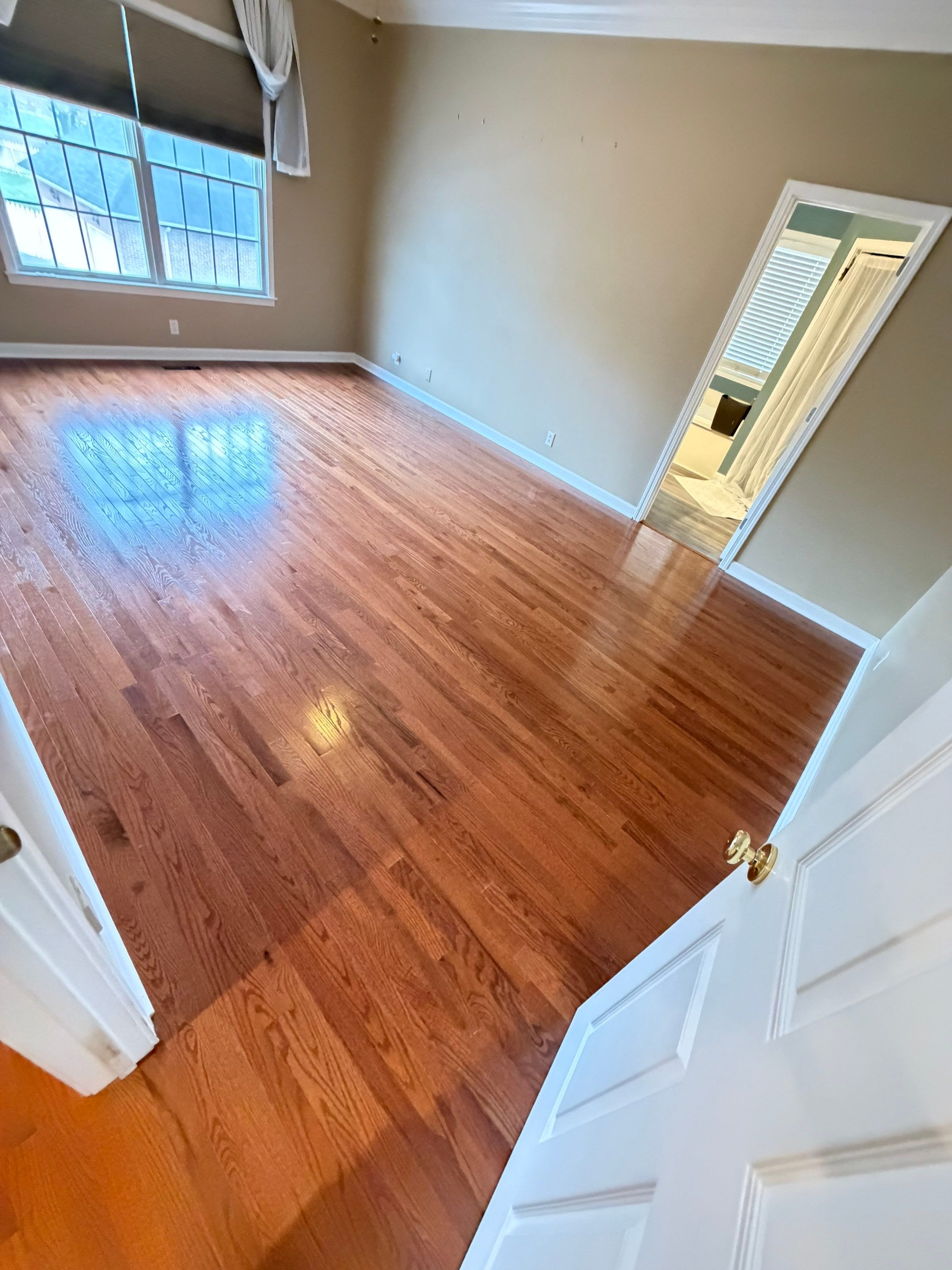 From carpet to prefinished hardwood by Footprints Floors of Nashville