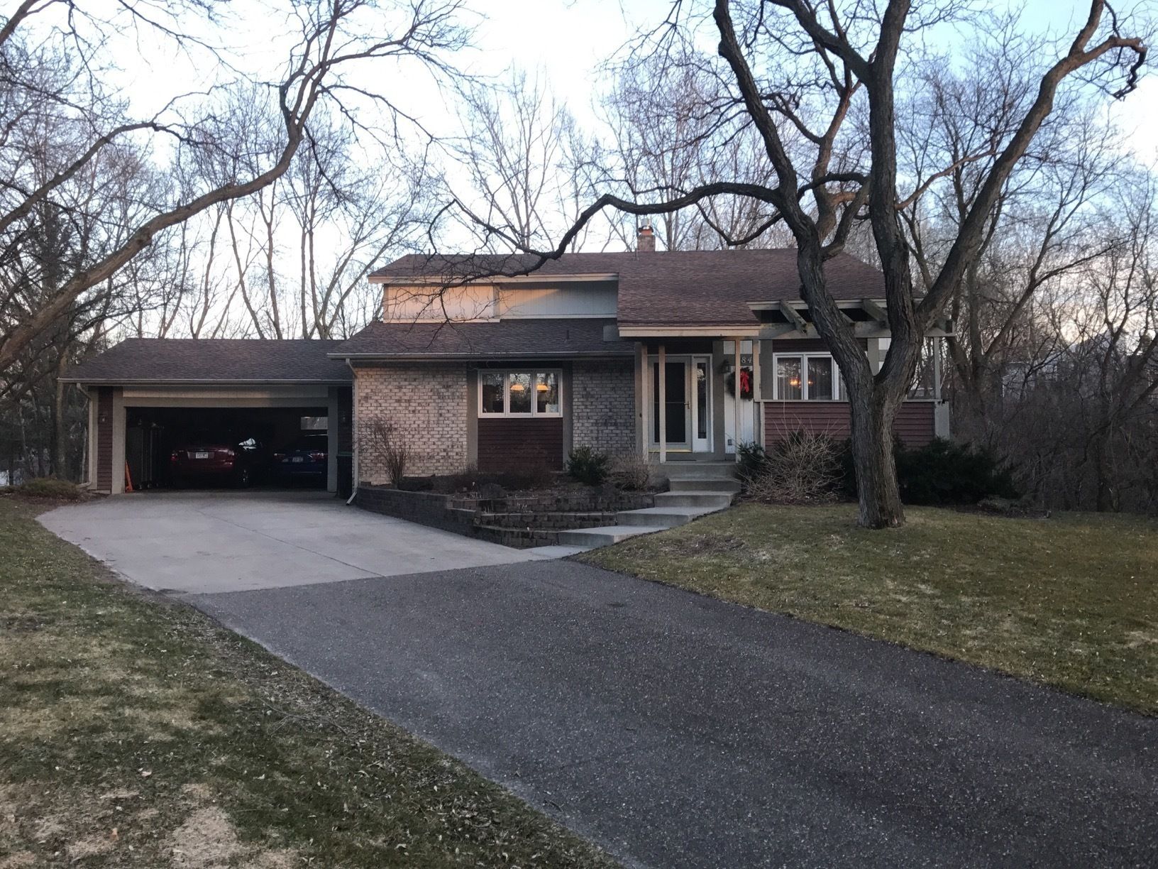 Siding Installation using LP SmartSide and Pella Vinyl Windows by MODERN EXTERIOR SYSTEMS