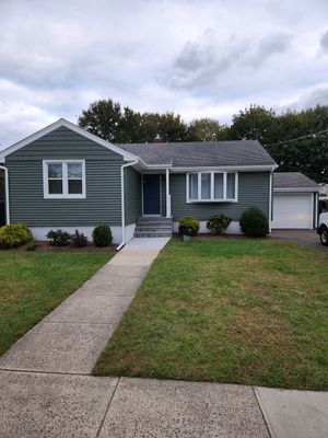 Siding Installation using Certainteed Monogram Forest Green