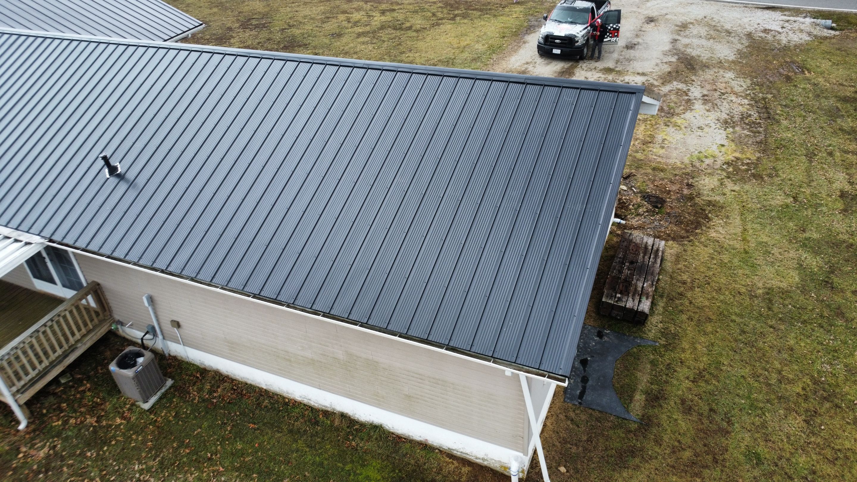 Residential 26 Gauge M-Rib Metal Roof + Gutters, Downspouts & Gutter Covers Install  by Titan Commercial & Residential Roofing 