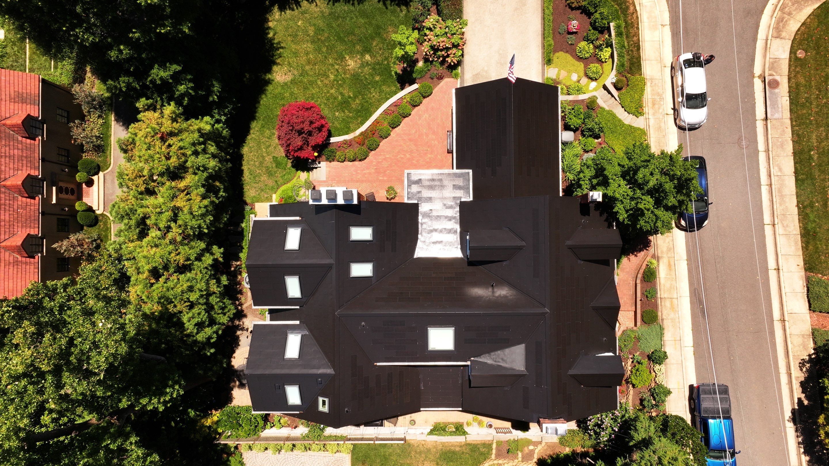 Sleek Tesla Solar Roof + Powerwall Installation | Alexandria, VA by American Home Contractors