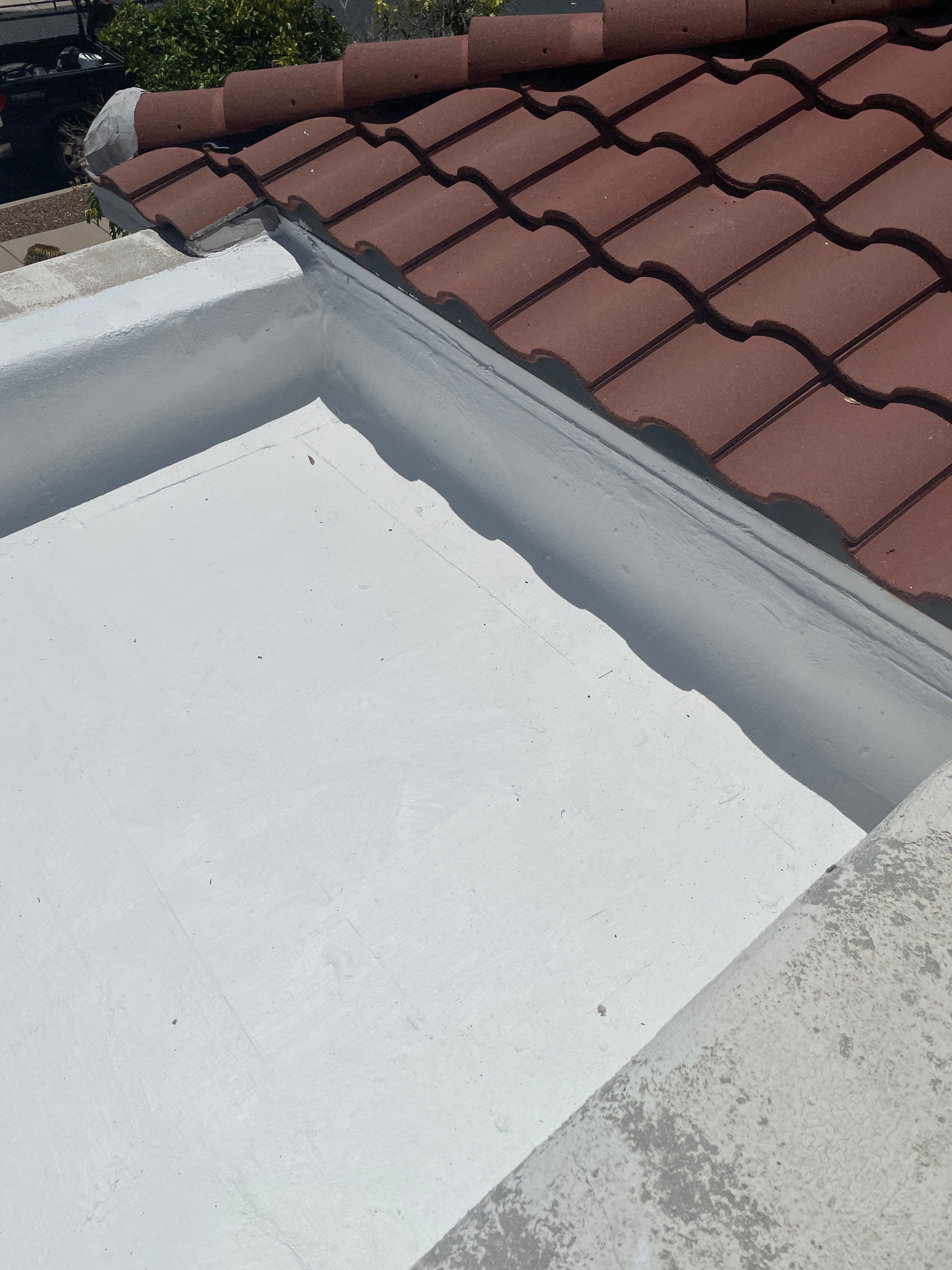 Tucson Residential Roof Restoration with Tile and Elastomeric Coating by West Coast Roofing AZ