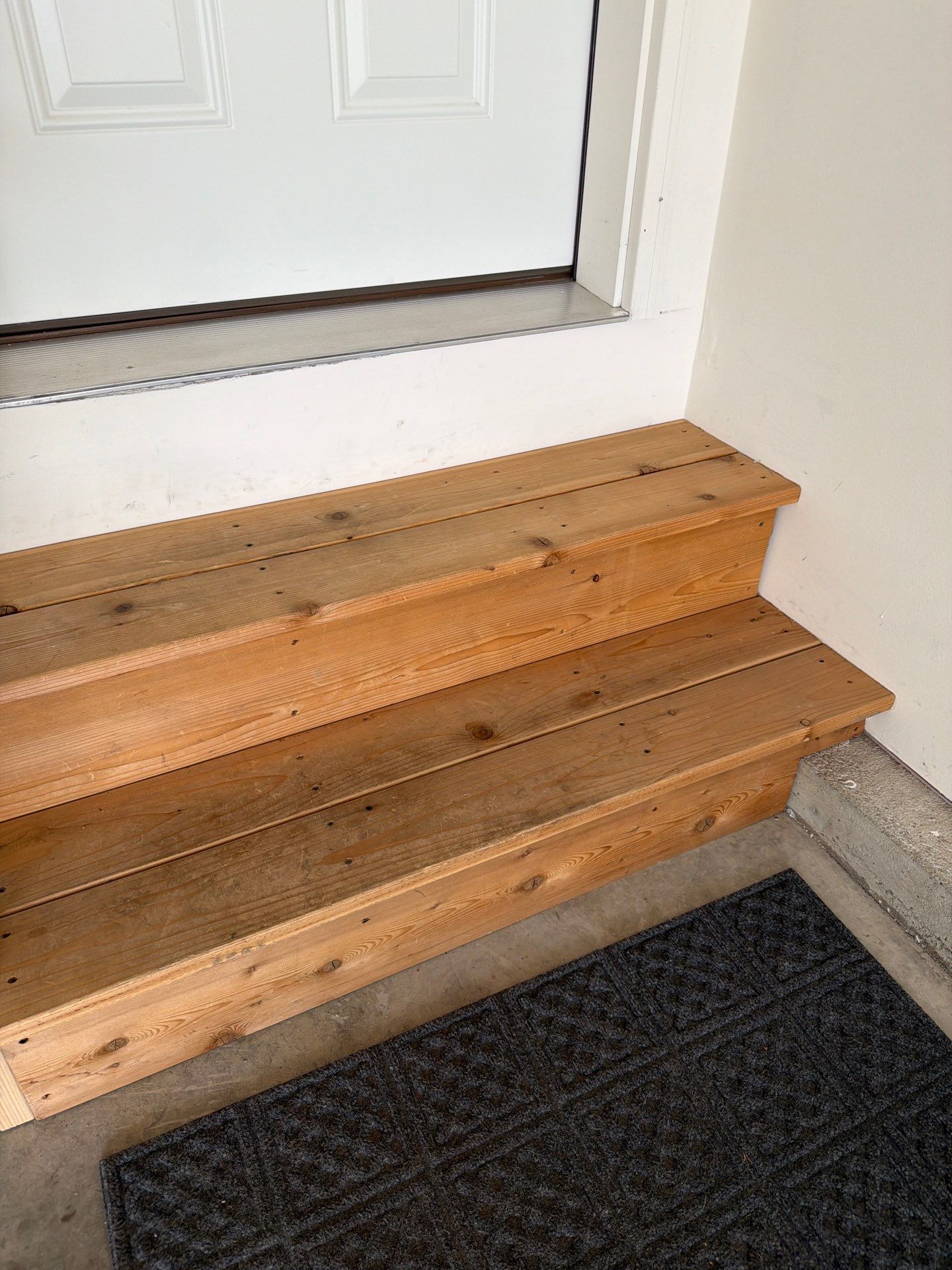 Cabin Fever Garage Floor Coating in Sioux Falls by Select Painting, Coatings & Garage Cabinets