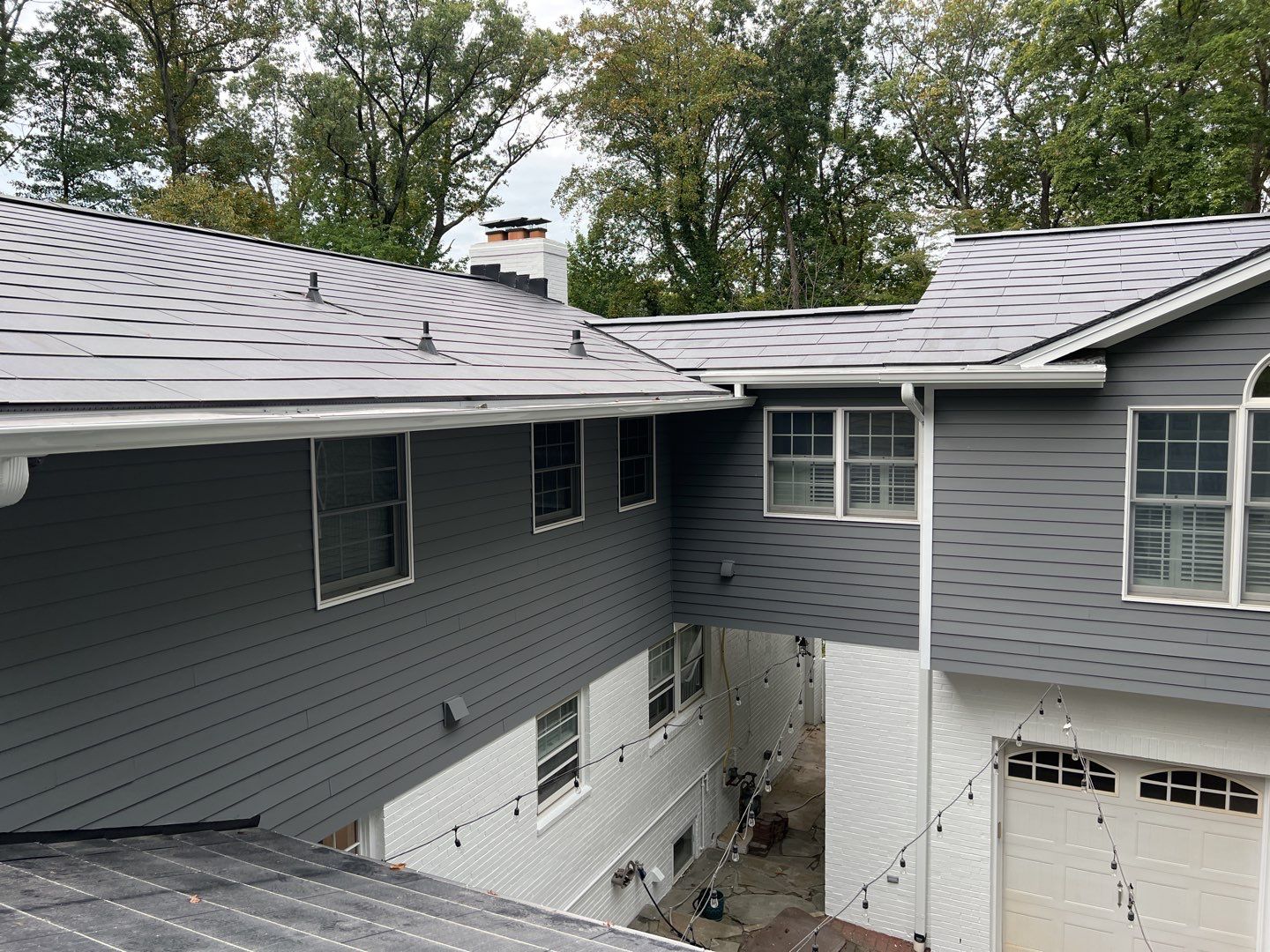 Tesla Solar Roof Replacement using Tesla Solar Roof V3 Tiles by American Home Contractors