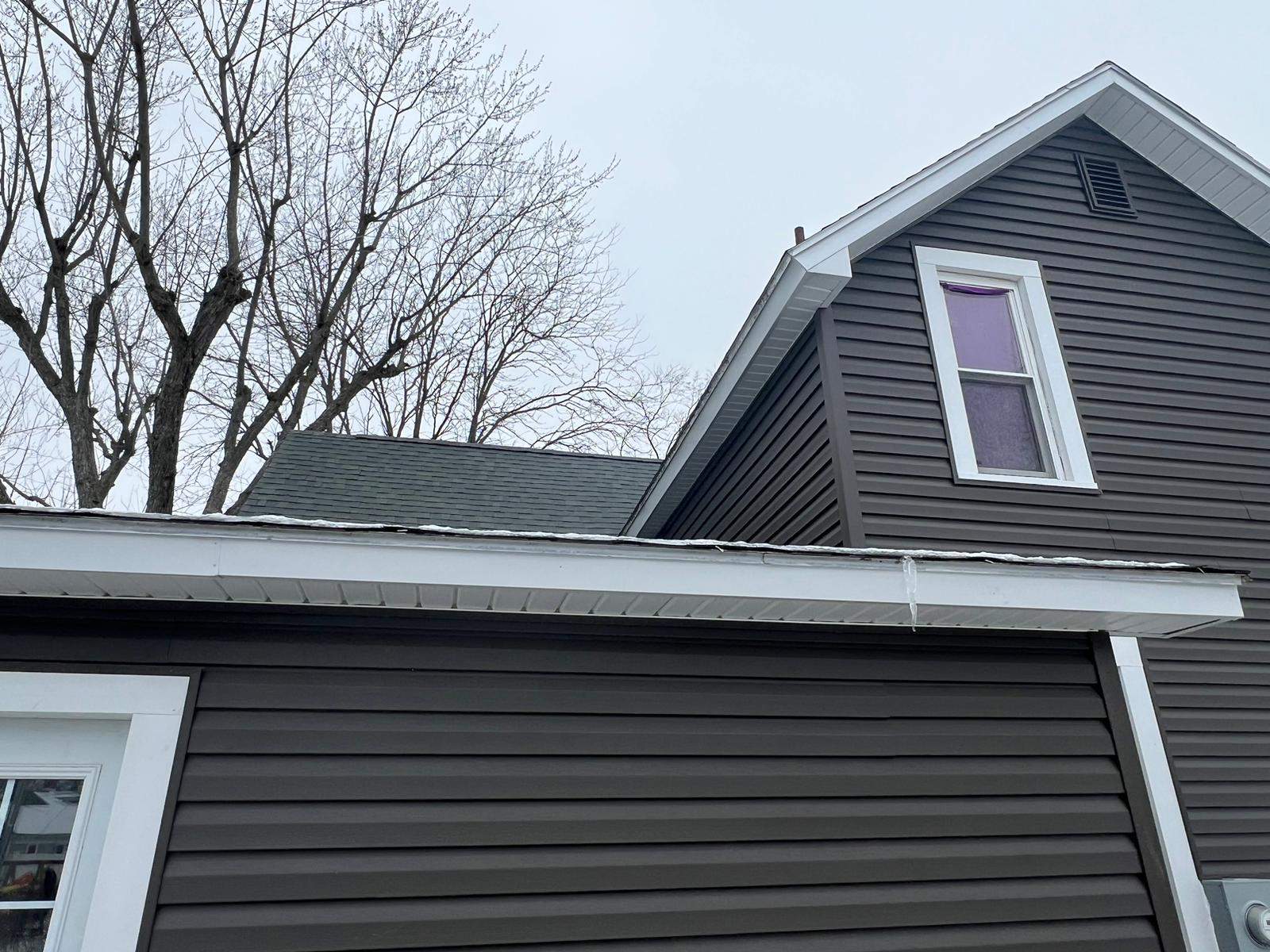 Residential fascia replacement using Exterior Portfolio 4.5 DL - Peppercorn by Nitro Roofing and Construction