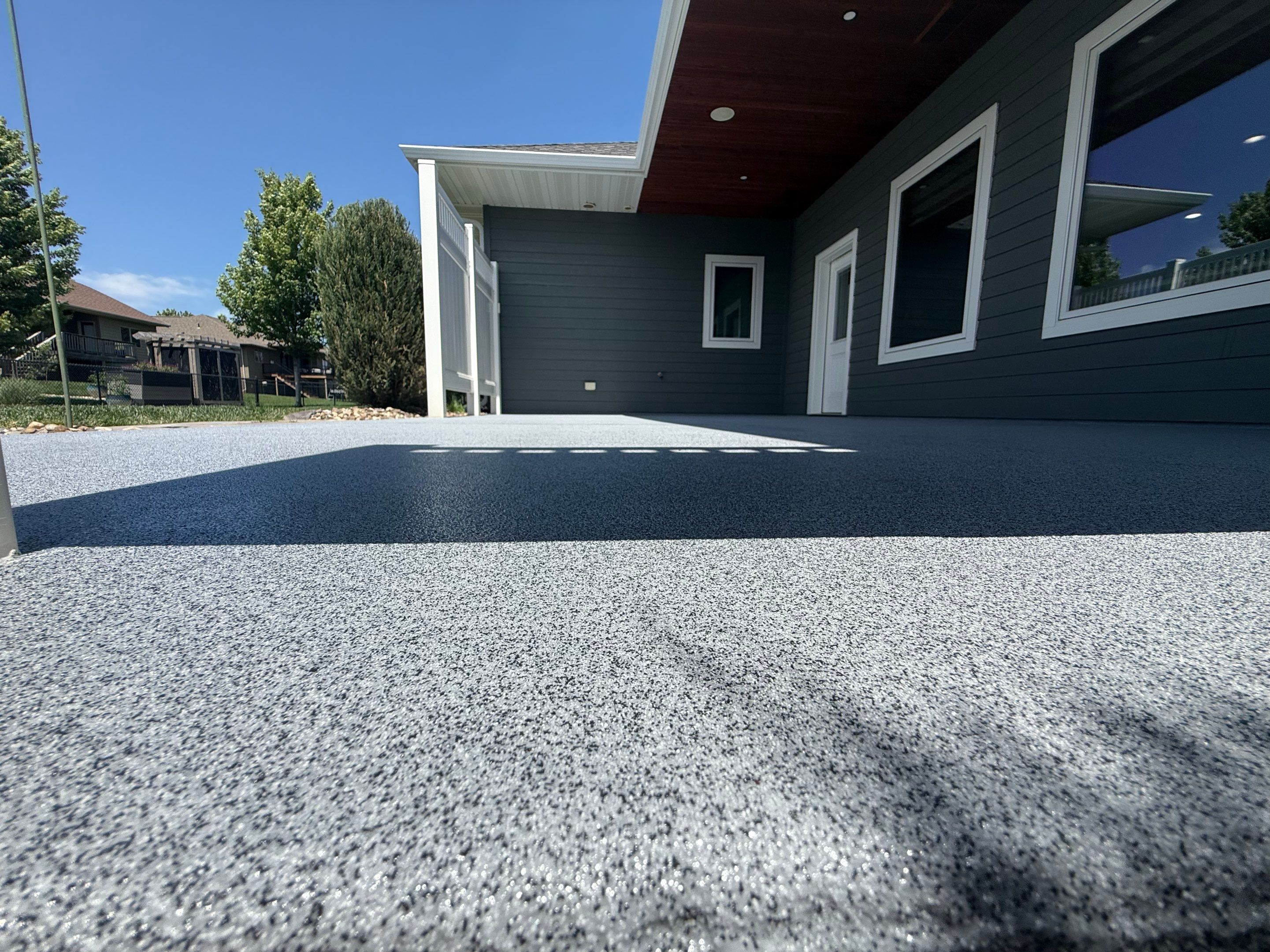 Polyurea Patio Floor Coating in Starry Evening for Sioux Falls Home by Select Painting, Coatings & Garage Cabinets
