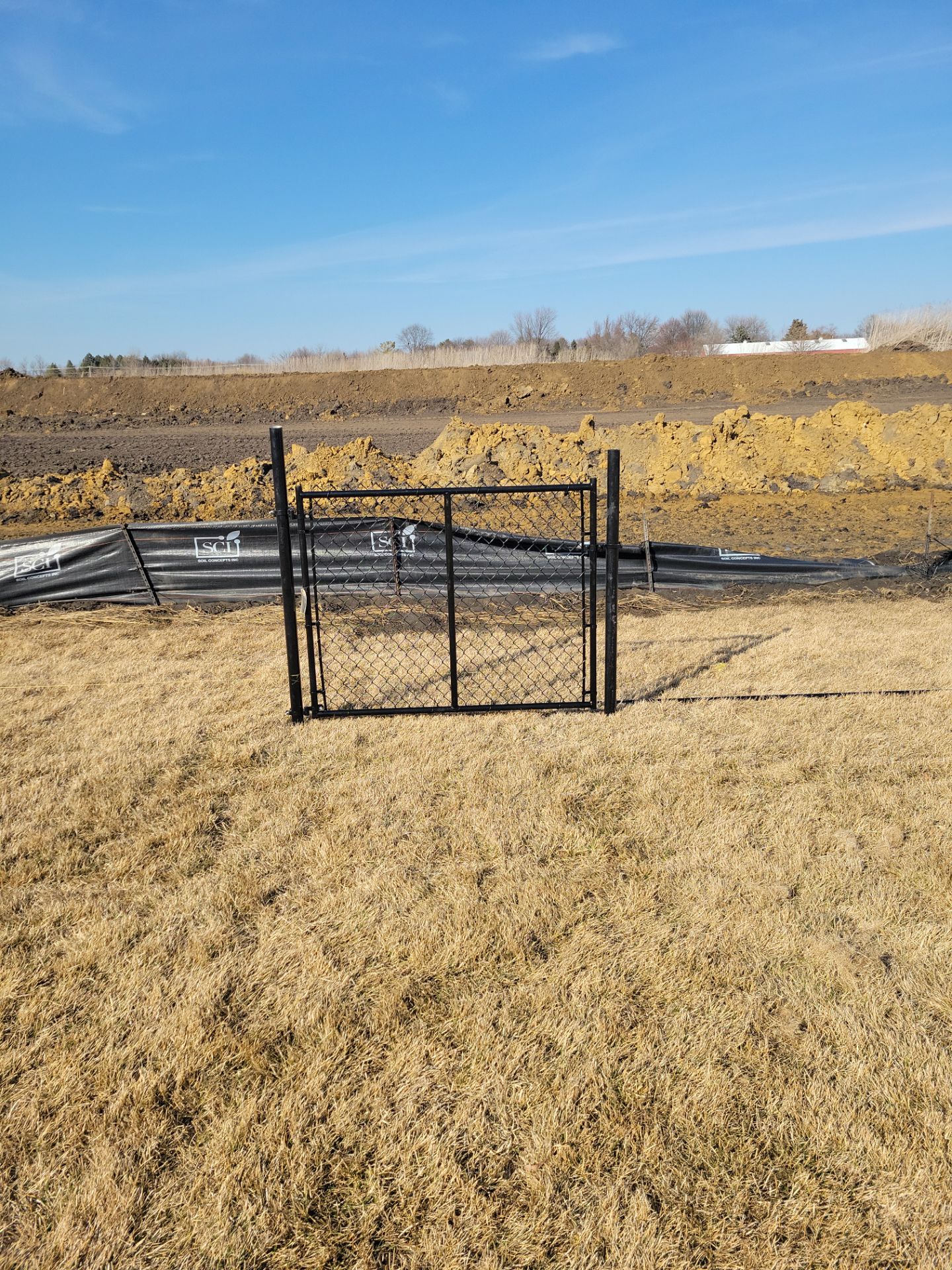Black Chain Link Fence and Gate Installation in Cedar Falls by Perfect Picket Fence and Stain