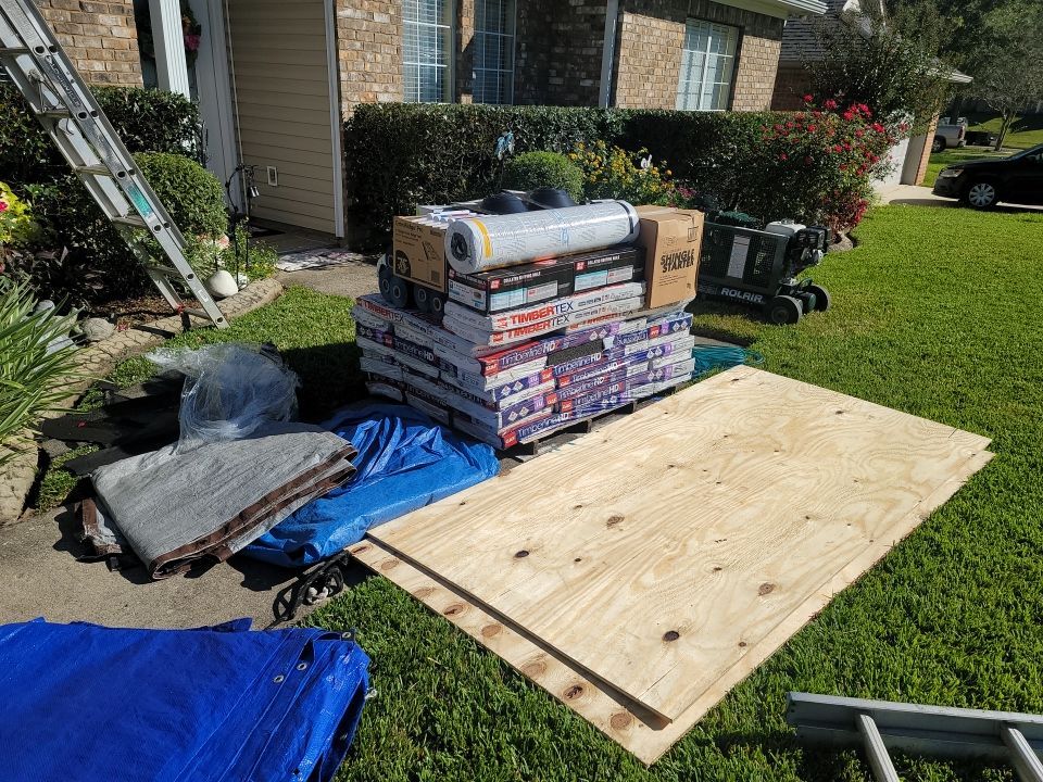 Residential Roofing Installation using Roof Replacement by American Roofing & Construction LLC