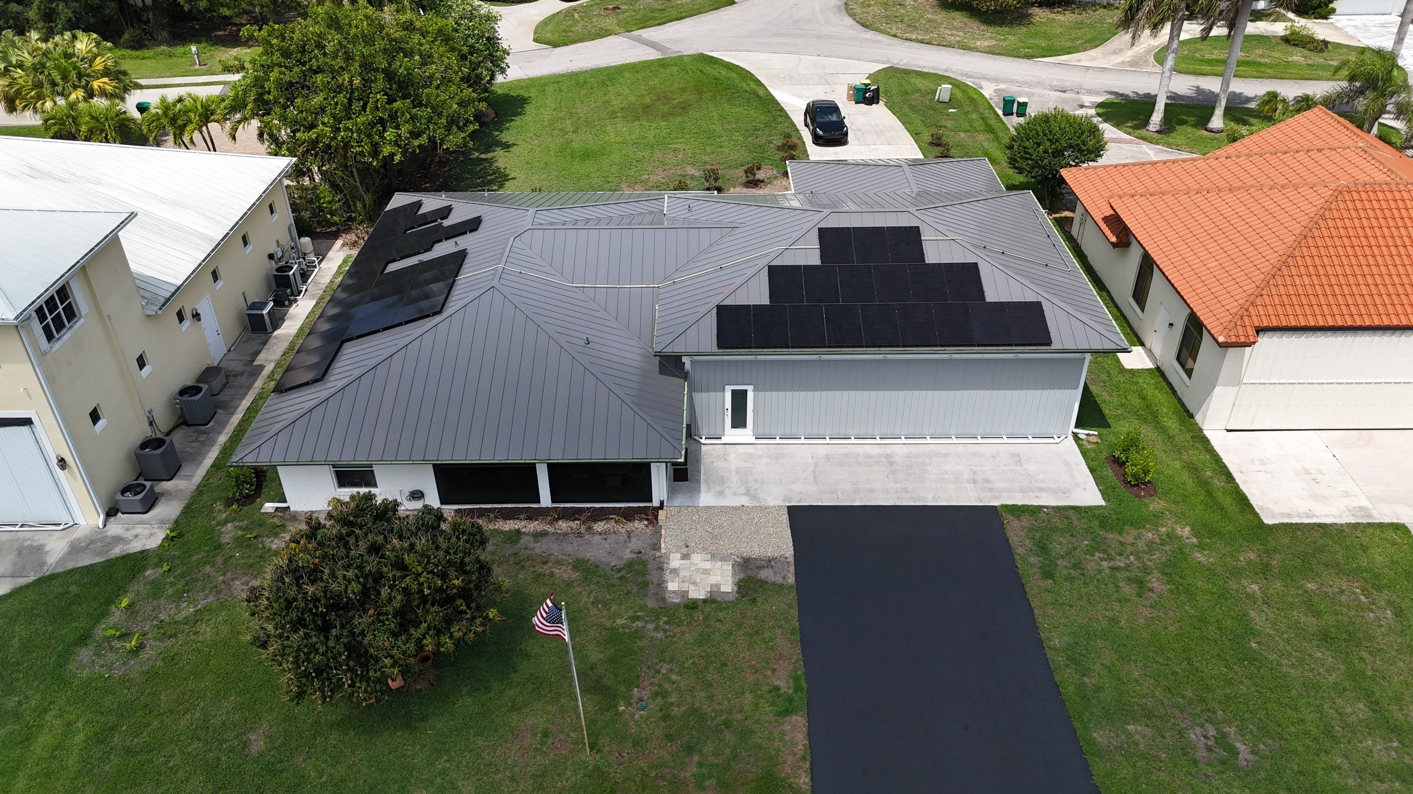 Standing Seam Metal Roof and Solar Powerwall Installation in Naples by Coastal Energy