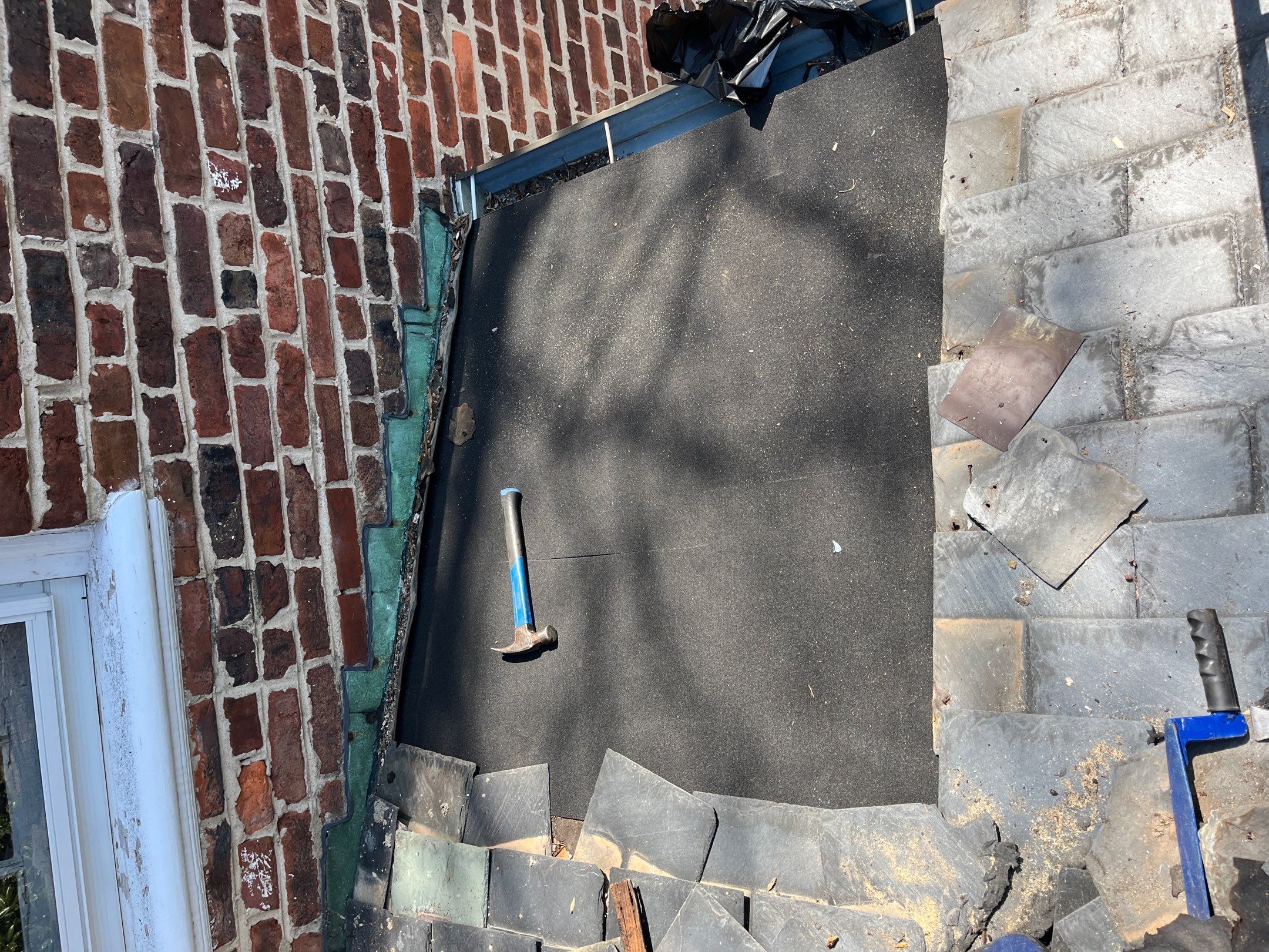Slate Roof Restoration and Copper Ridge Cap Install in Richmond by Cade Construction
