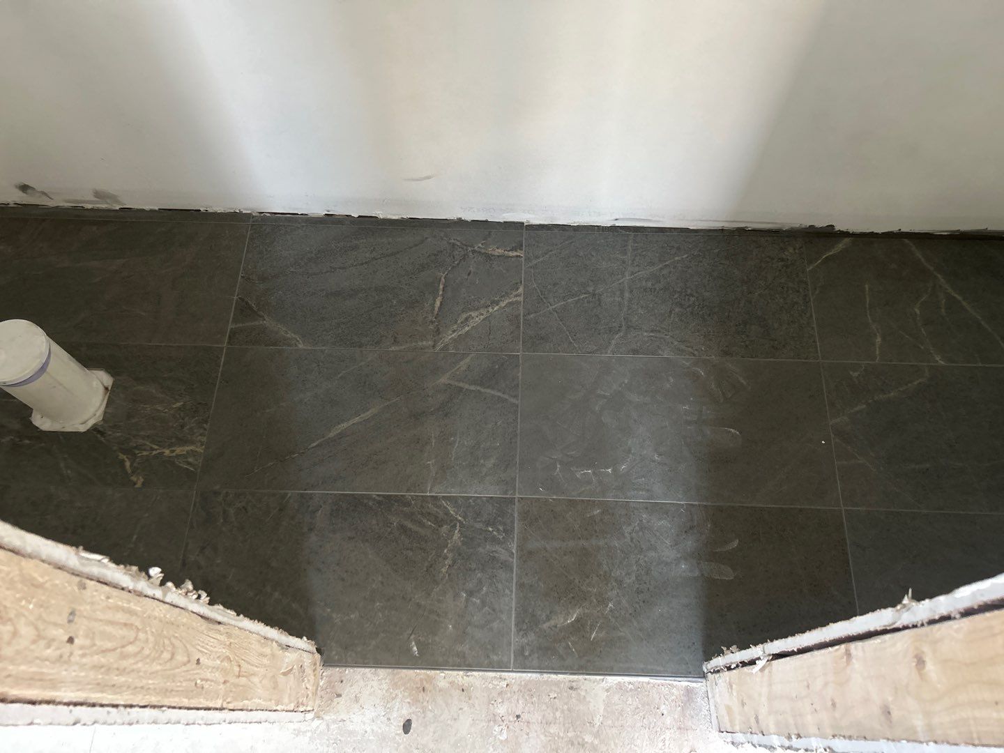 Tile floors, walls, showers, and accent wall for bathrooms  by Footprints Floors of Nashville