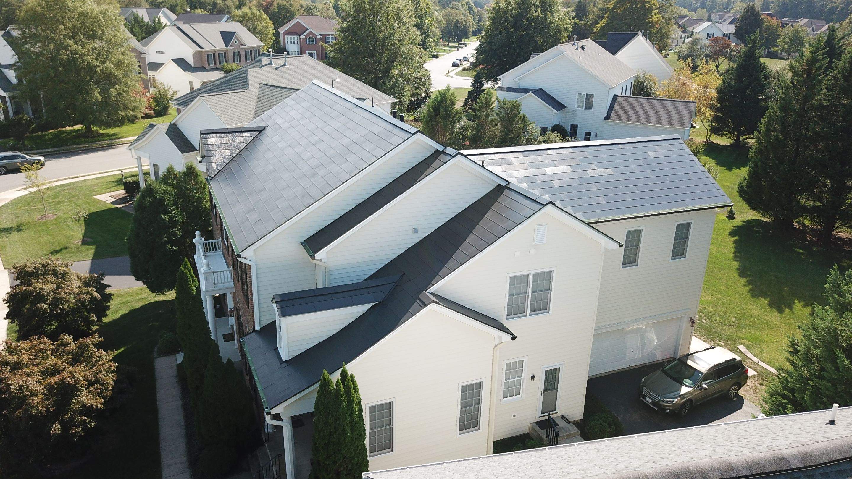 Tesla Solar Roof Replacement using Tesla Solar Roof V3 tiles by American Home Contractors