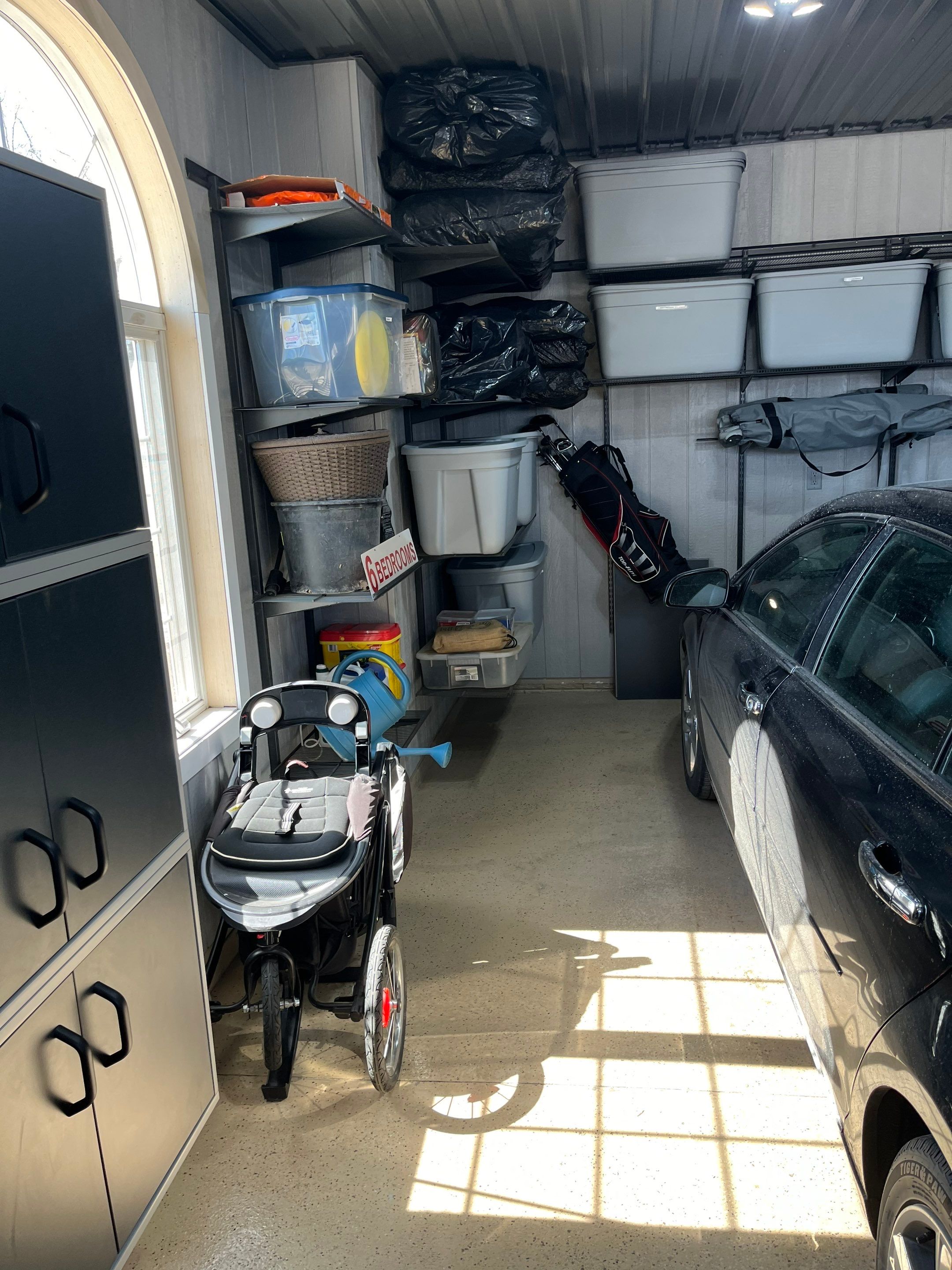 High-Gloss Grey Epoxy Floor Coating for Inwood Garage by Select Painting, Coatings & Garage Cabinets