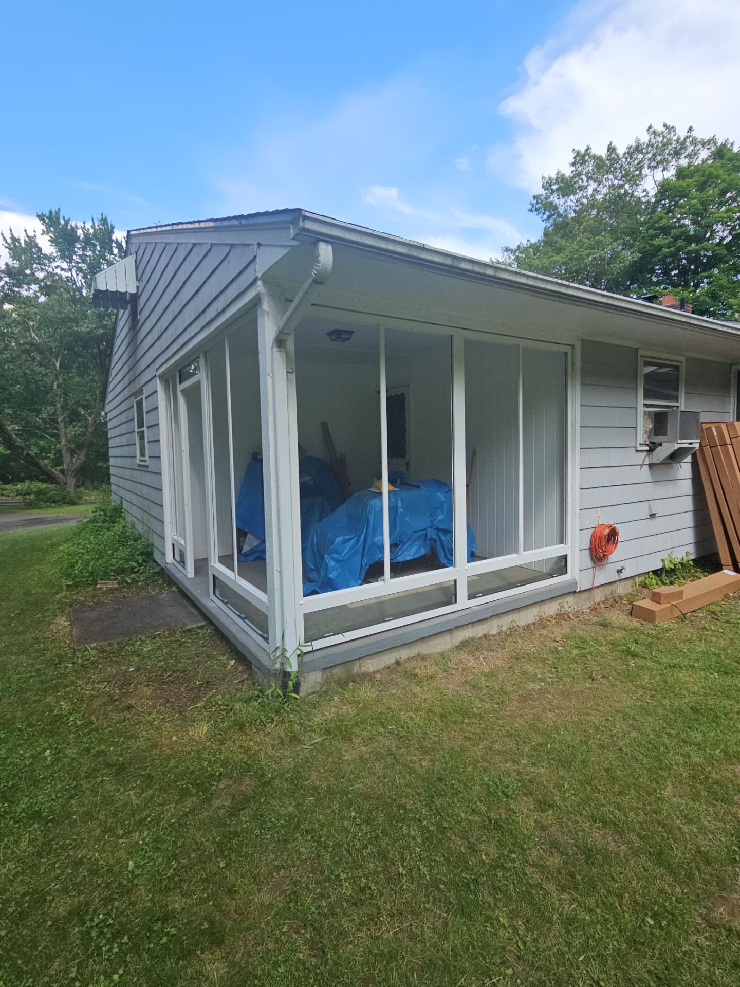 Summer Space Porch Enclosure by DiGiorgi Roofing and Siding Inc