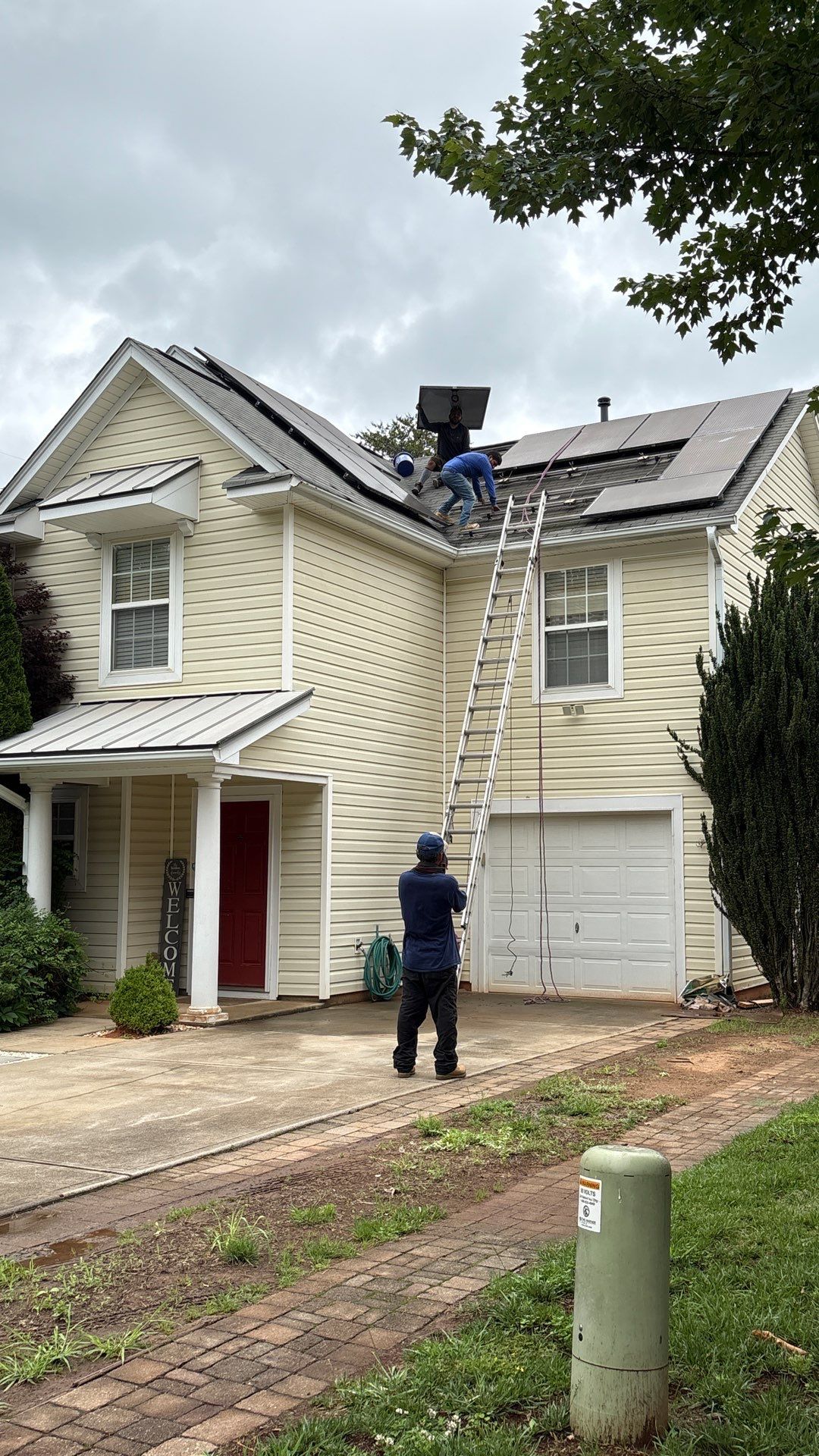 Roof and downspout replacement by hail and wind damage by Just Brilliant Restoration JBR