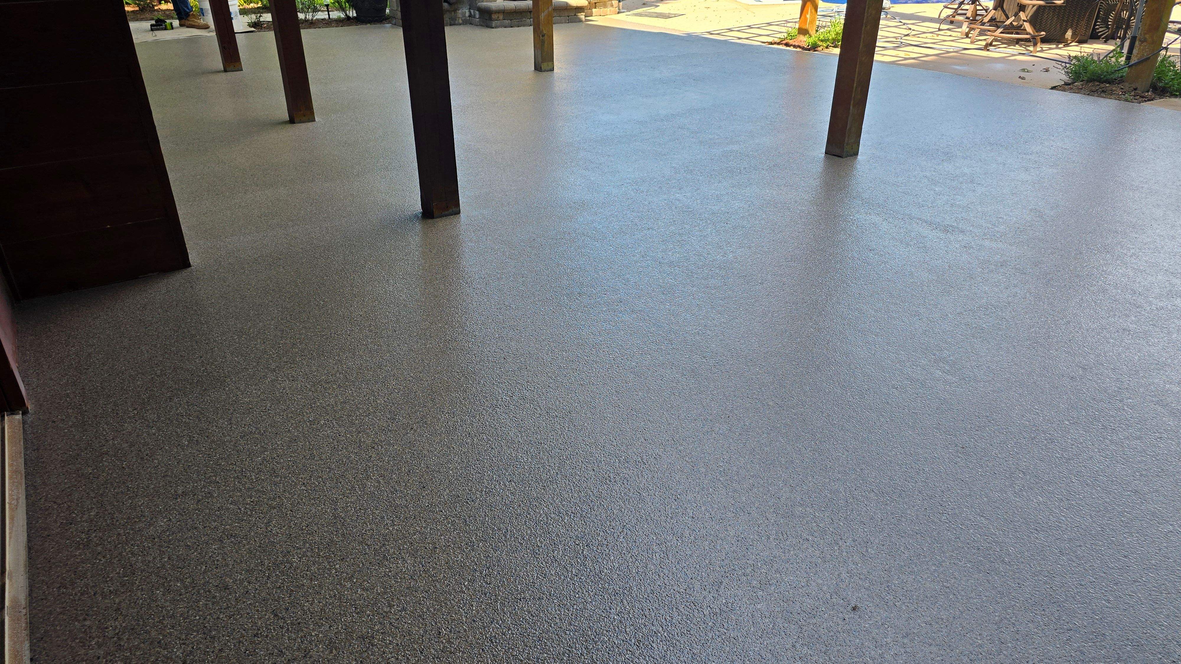 Back Patio using Obsidian by Elite Floor Solutions