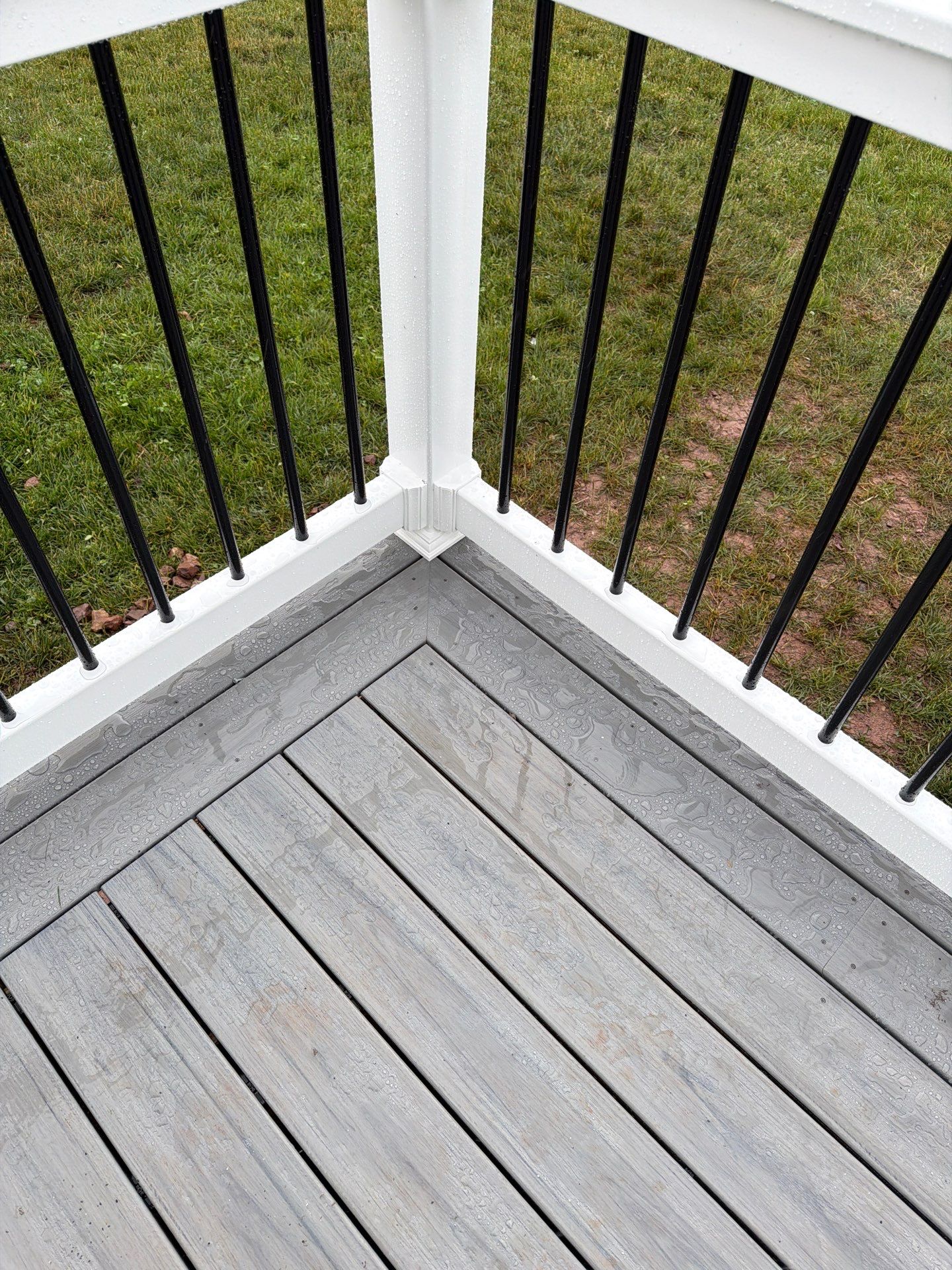 Custom Gray Composite Deck Installation in Duncannon by Esh Builders