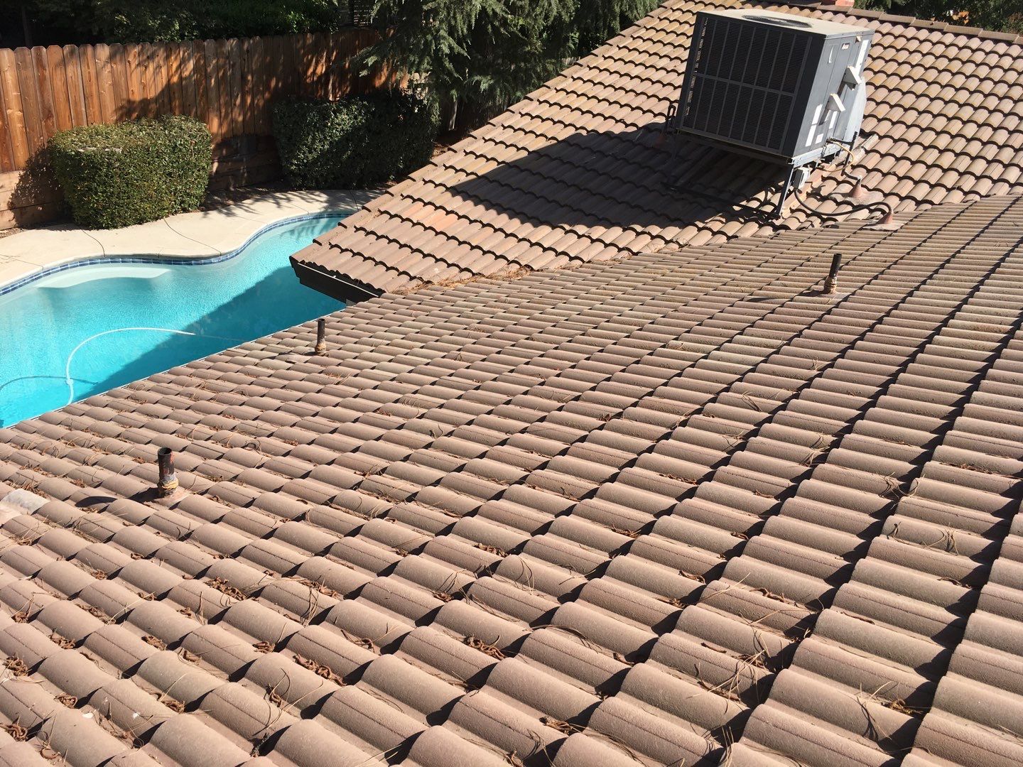 Tile roof remodel/ install OSB sheathing under tile and replace using OSB board with new underlayment, tile, and battens by Straight Edge Roofing Inc