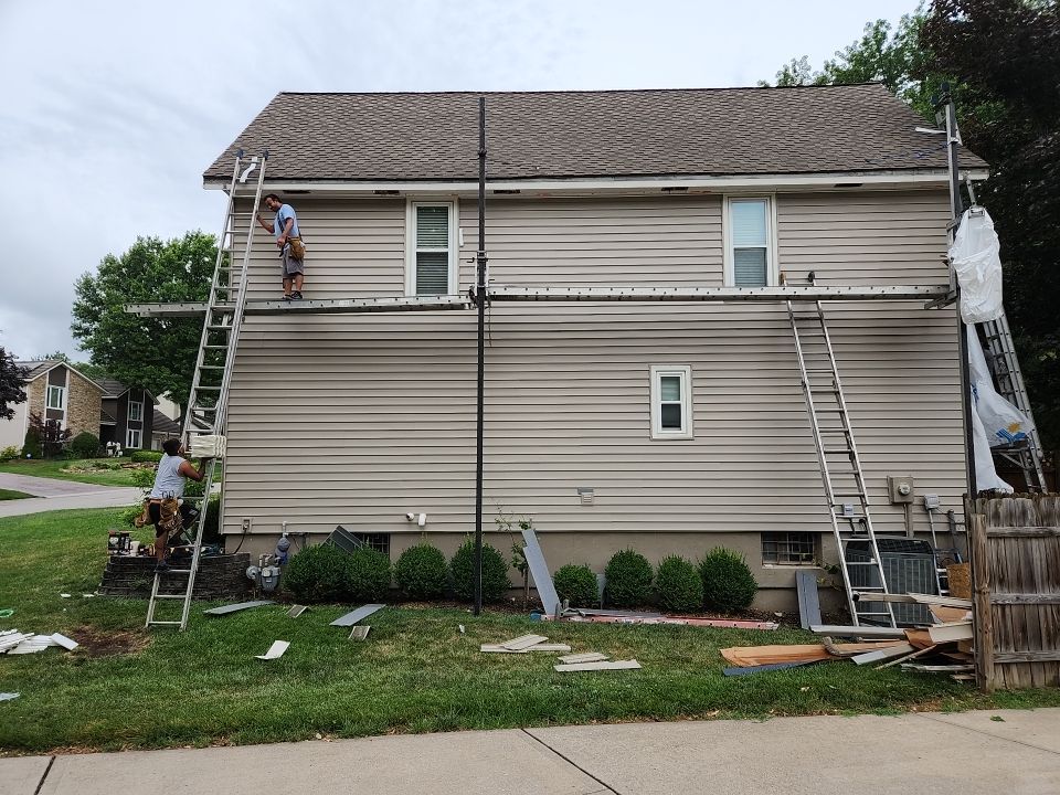 All New Craneboard D7 siding and New prefinished front door   by EEC  Windows, Siding & Roofing 