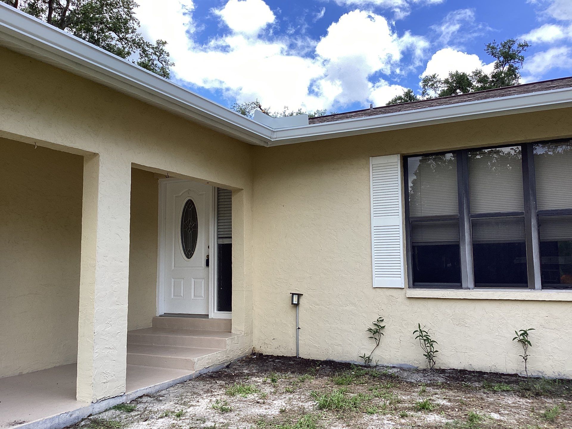 New Soffit and Fascia and White Gutters  by Gutter Professors