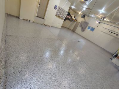 Sioux Falls Garage Floor Repair and Speckled Epoxy Coating Installation