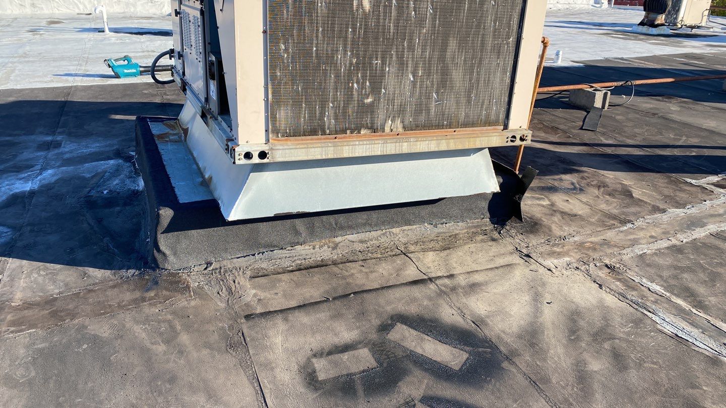 Commercial Roofing Repair using new Flashing by Alpha Design Services