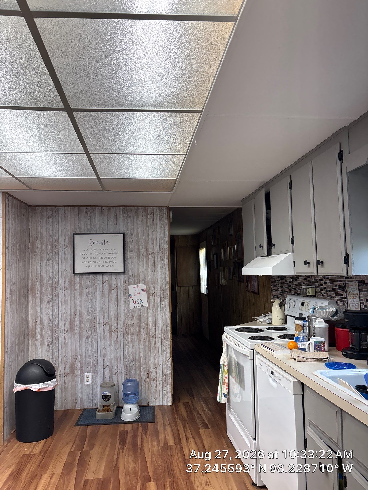 Kitchen Remodel Featuring Gray Cabinetry and Wood-Look Flooring by CompanyCam Sales Demo