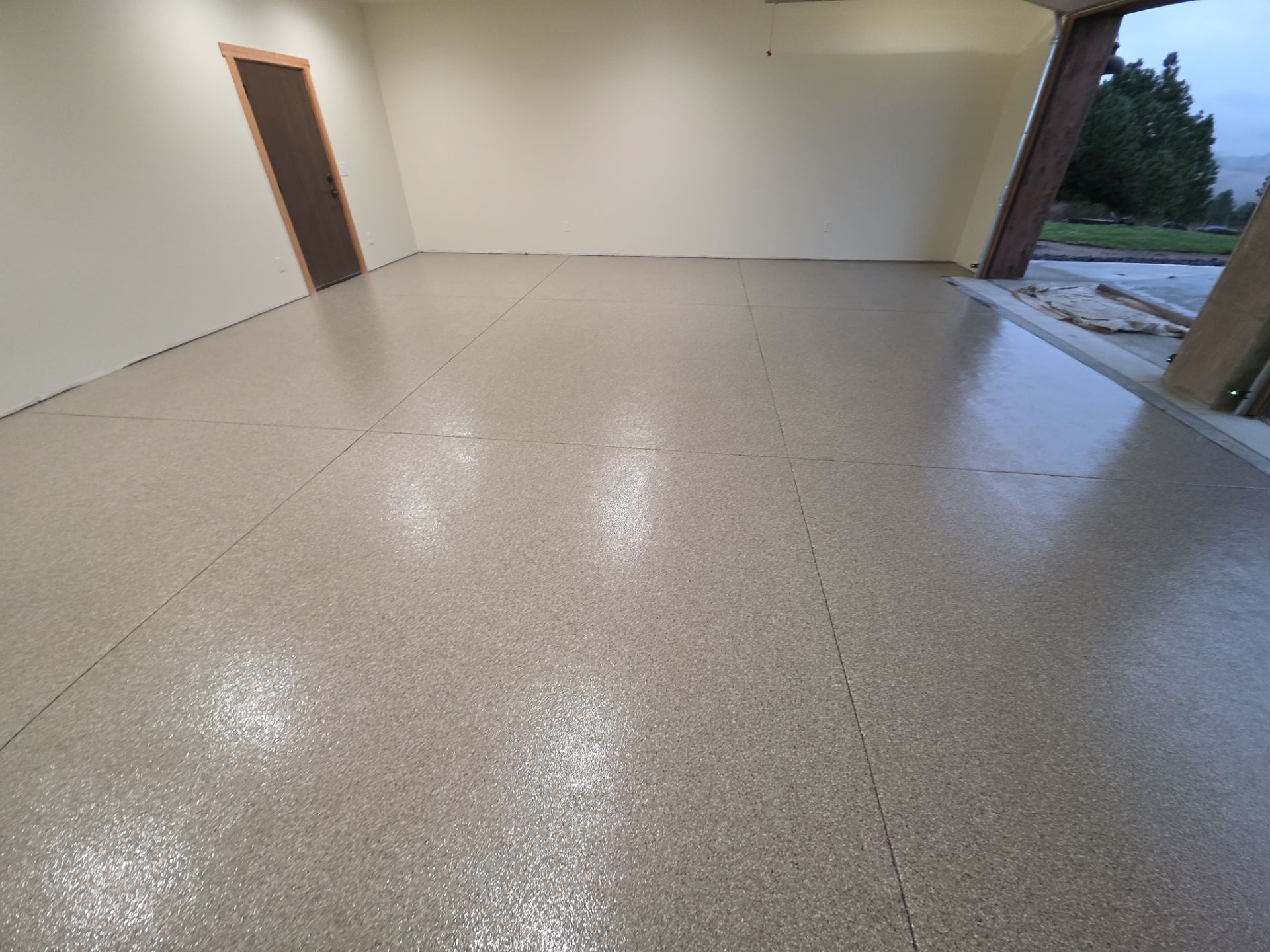 Garage Transformation using Pebble Beach by Croc Coatings, LLC