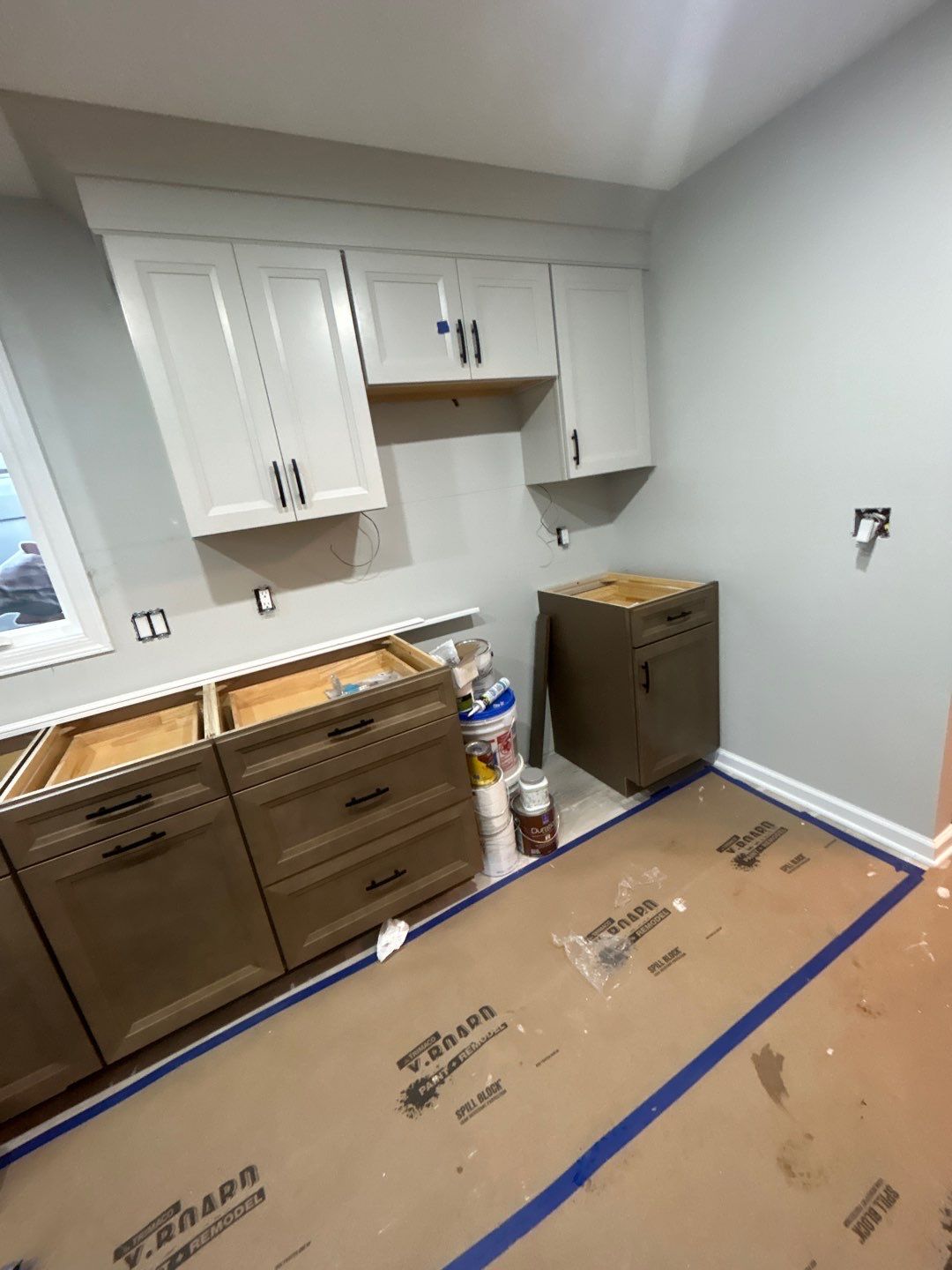 Interior Renovations, Kitchen Remodel, and Window Replacement by Ivy Lea Construction