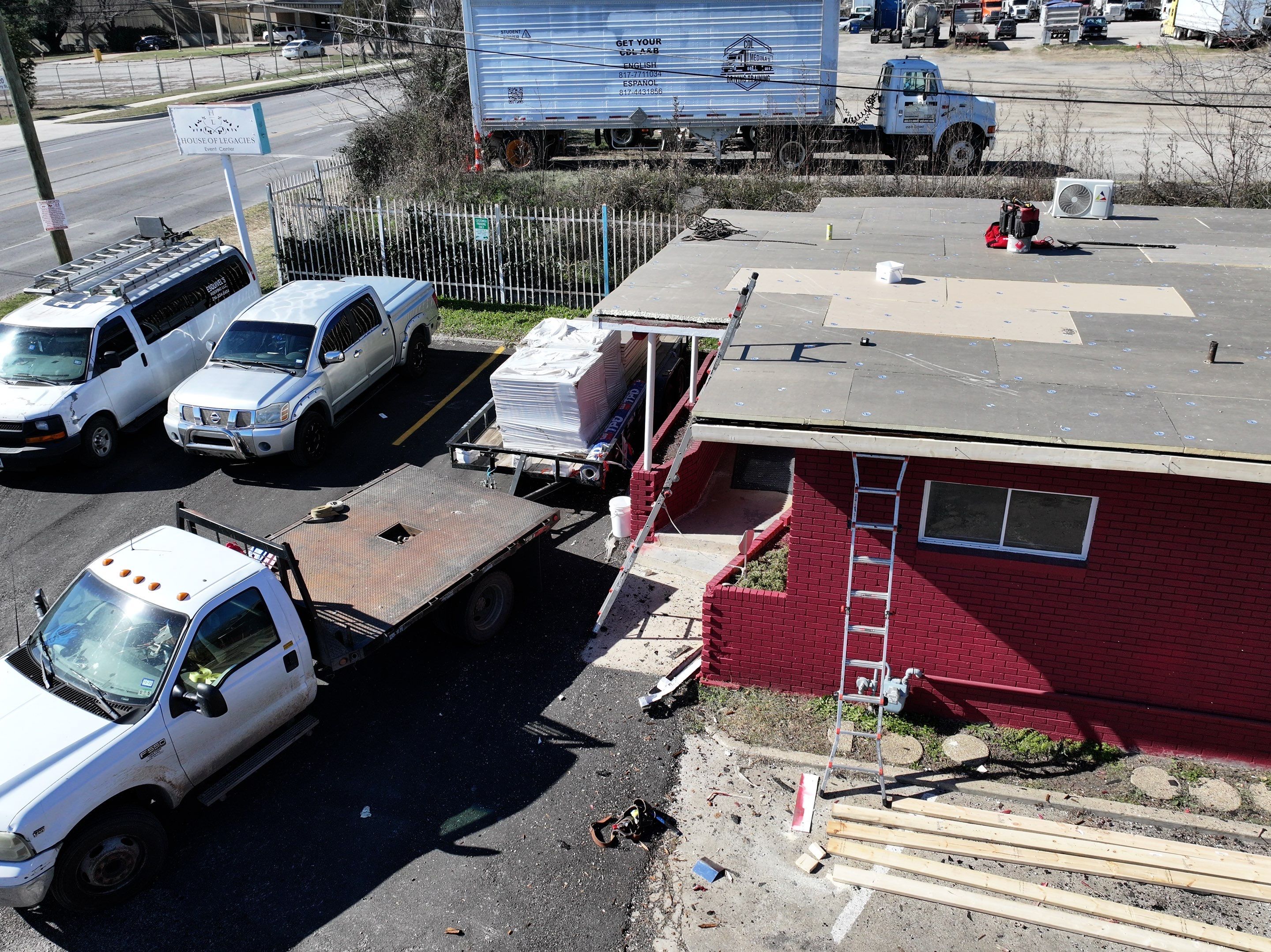 Commercial roofing overlay using GAF TPO over an old ballast roof by Becker Roofing and Exteriors