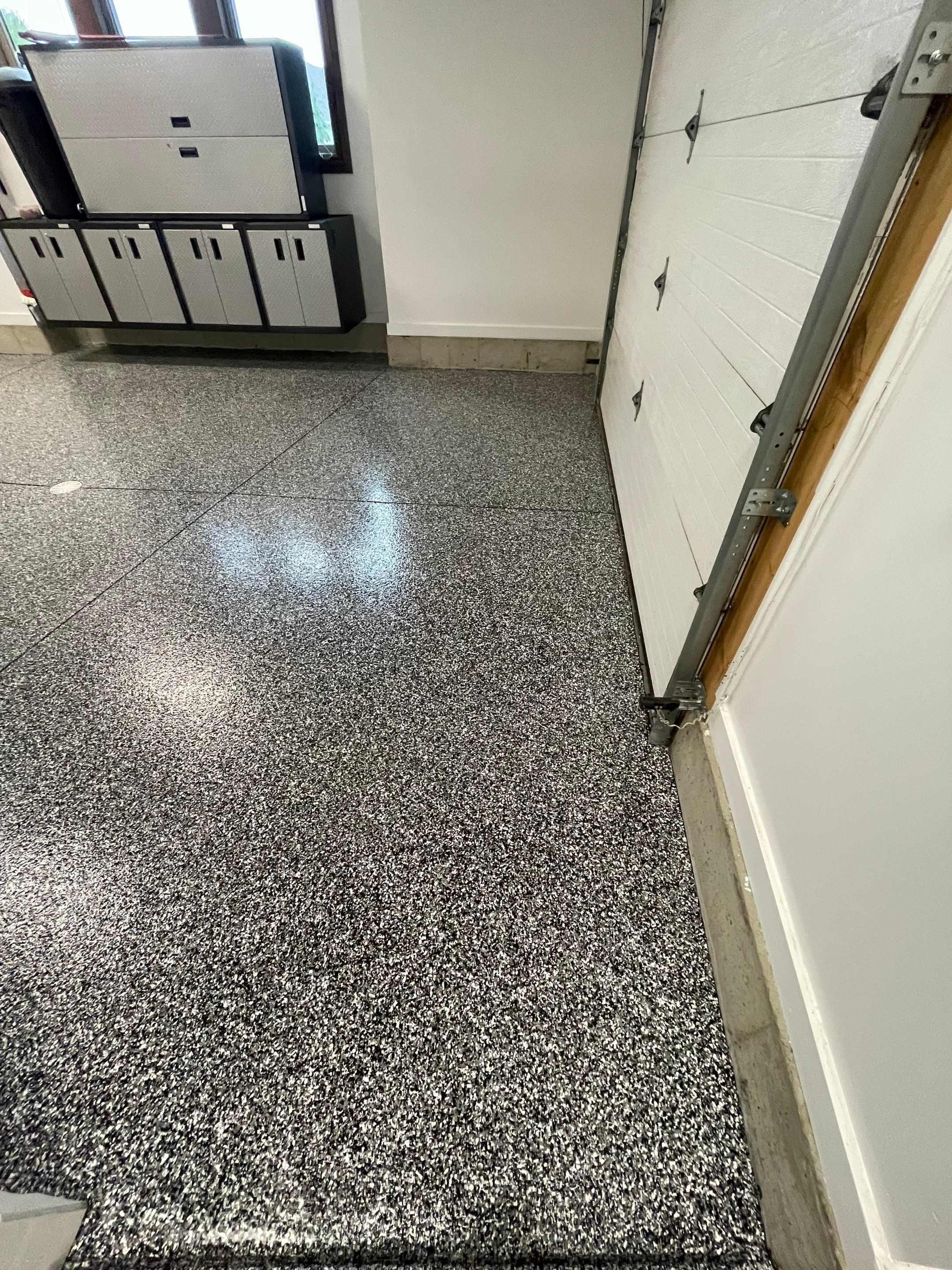 Garage Floor Coating and Domino Flake Finish in Sioux Falls by Select Painting, Coatings & Garage Cabinets
