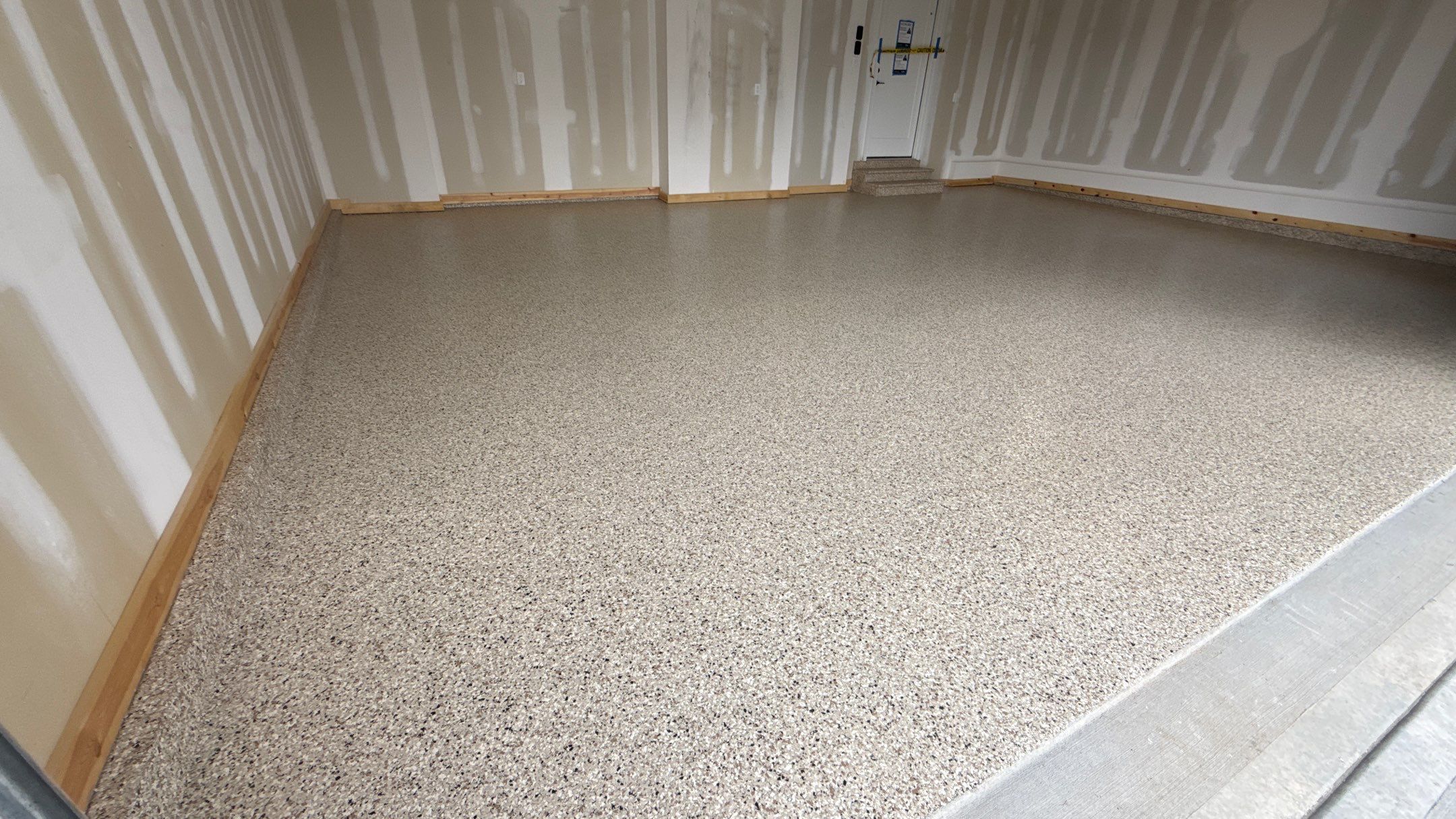 Mark Chose The Best Time To Do His Floor, Right Before Move In  by Banner Garage