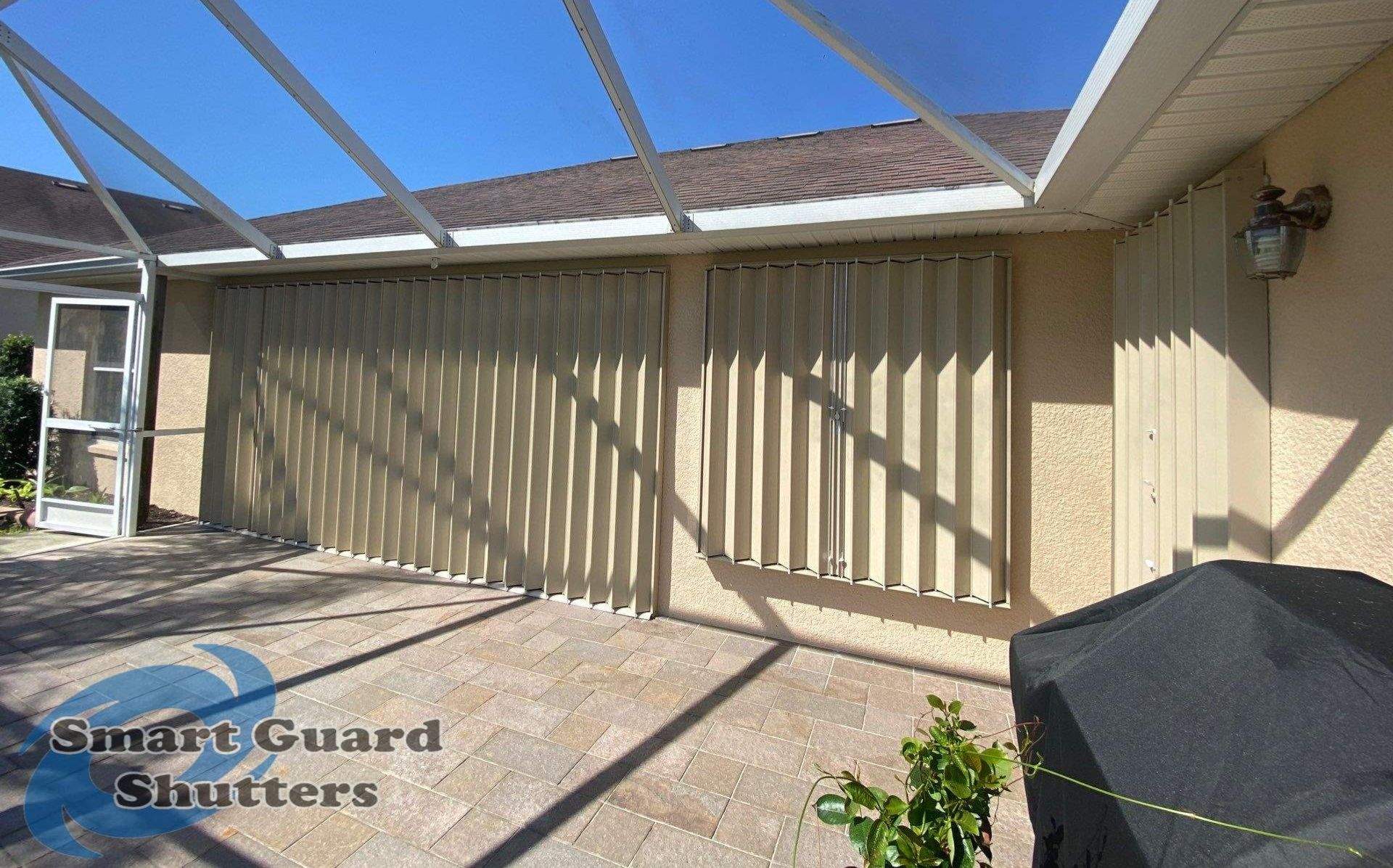 Accordions in Beige by Smart Guard Shutters