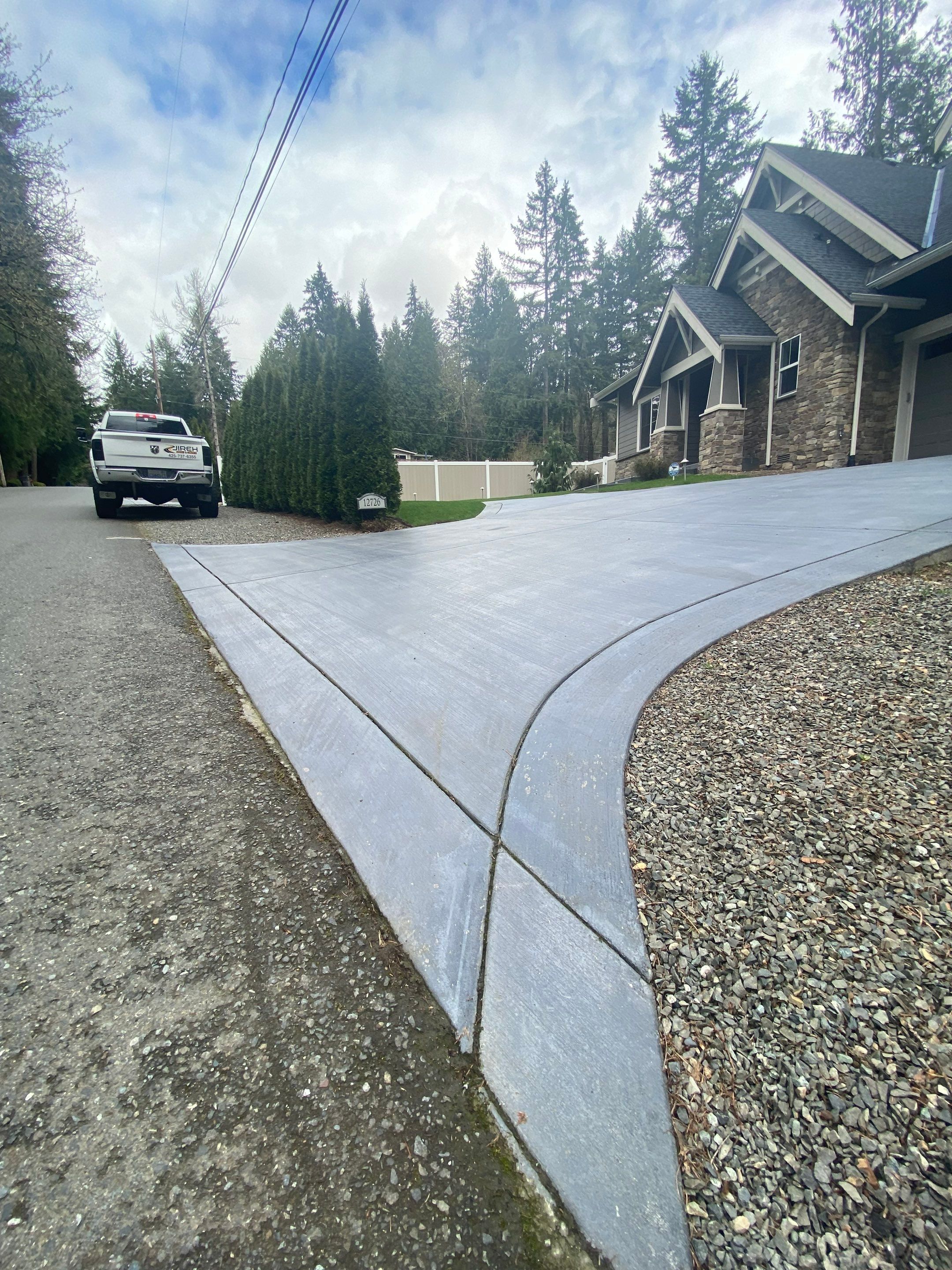 Melanie | Concrete Driveway  by Jireh Asphalt & Concrete Inc 