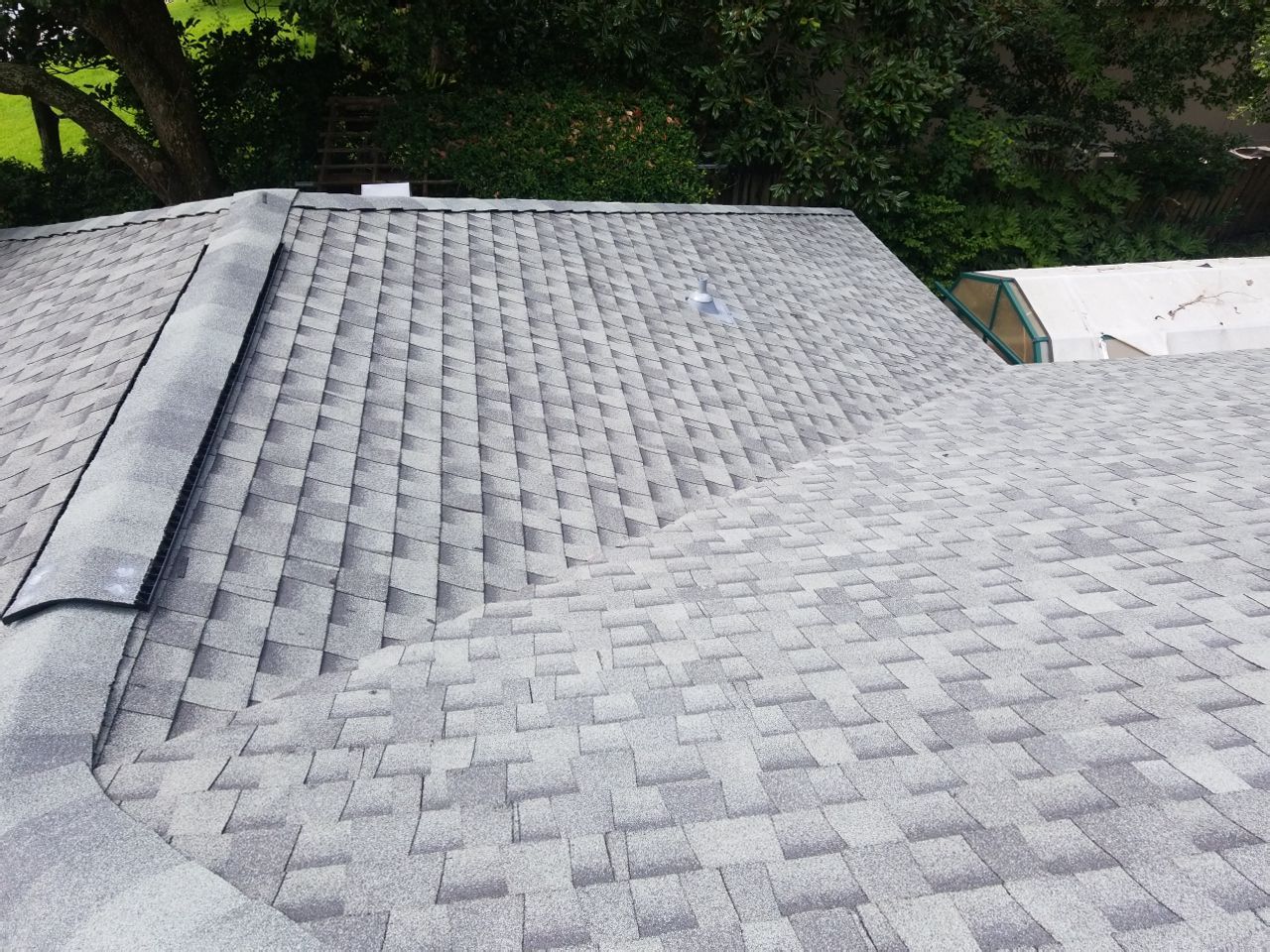 Residential Roofing Installation using Roof Replacement by American Roofing & Construction LLC