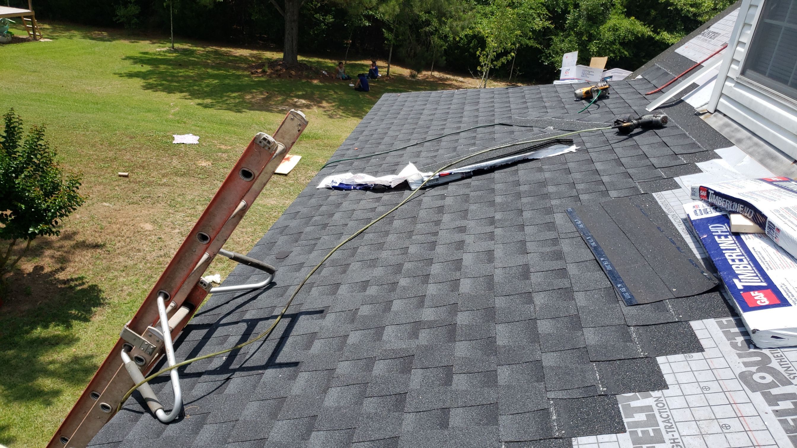 Residential Roofing Installation using Roof Replacement by American Roofing & Construction LLC