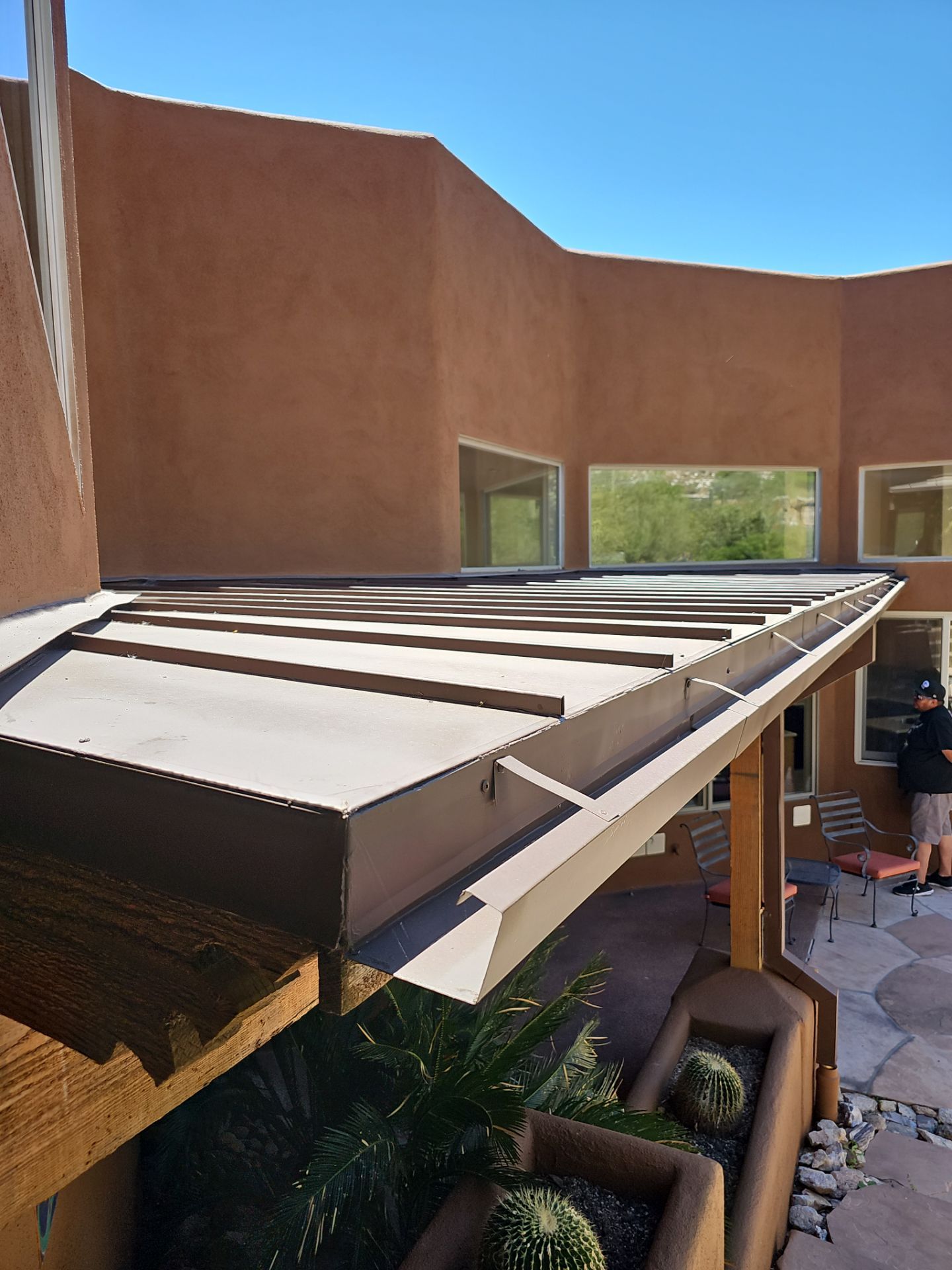 Light Stone Exposed Fastener by Reimagine Roofing