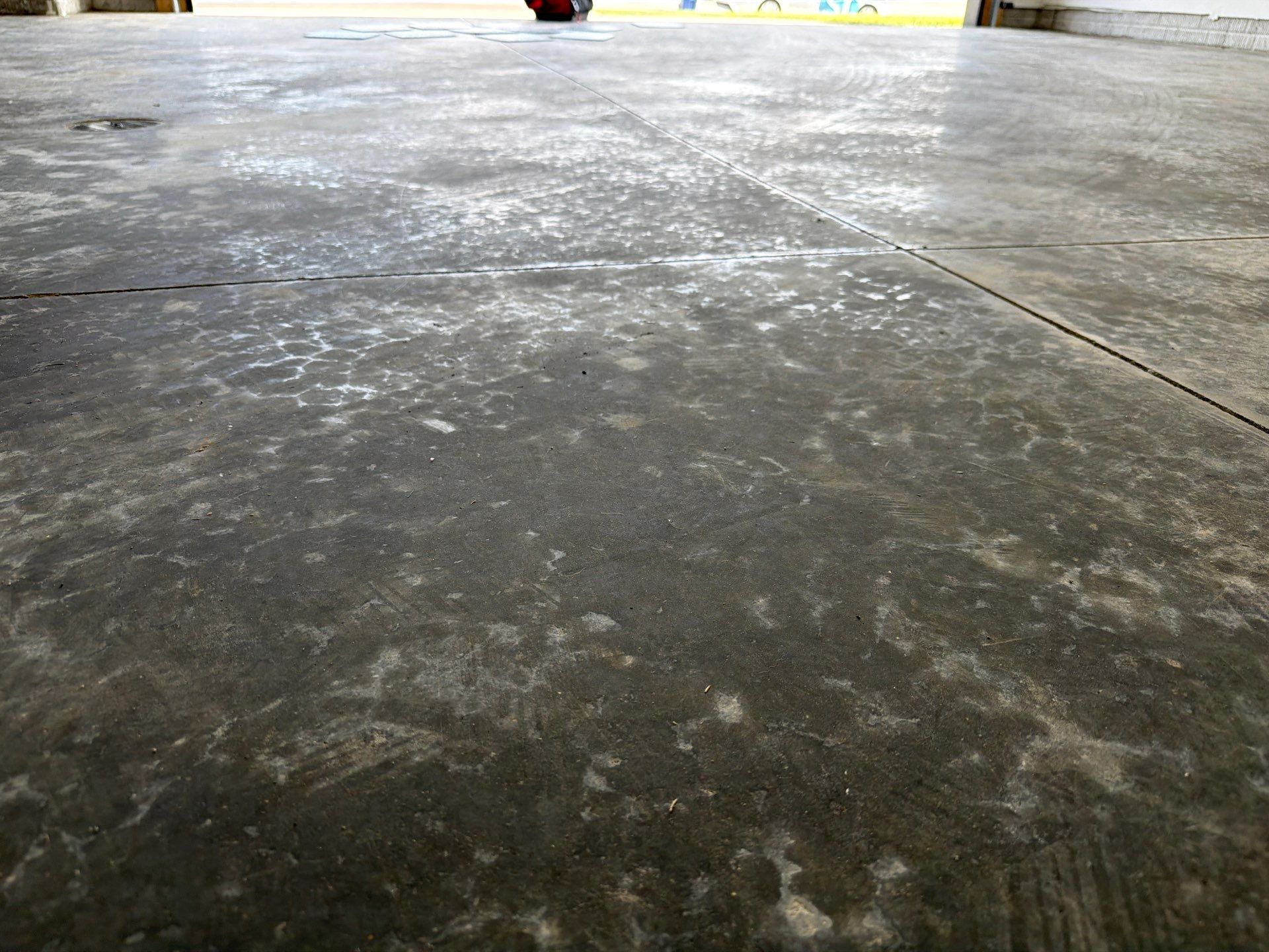 Cabin Fever Decorative Flake Garage Floor Coating in Sioux Falls by Select Painting, Coatings & Garage Cabinets
