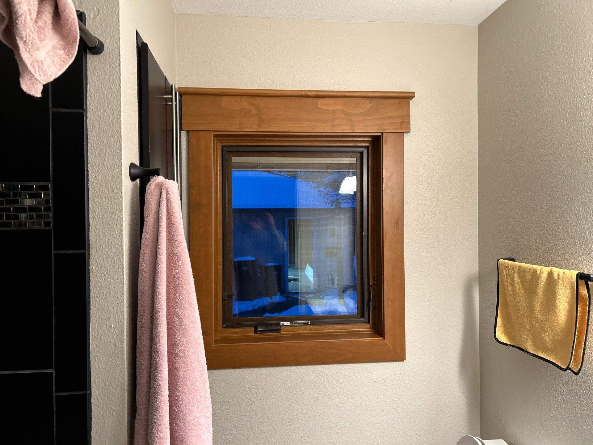 Black-Frame Pella Lifestyle Upgrade on a Partial Brick Home by United Windows and Siding LLC