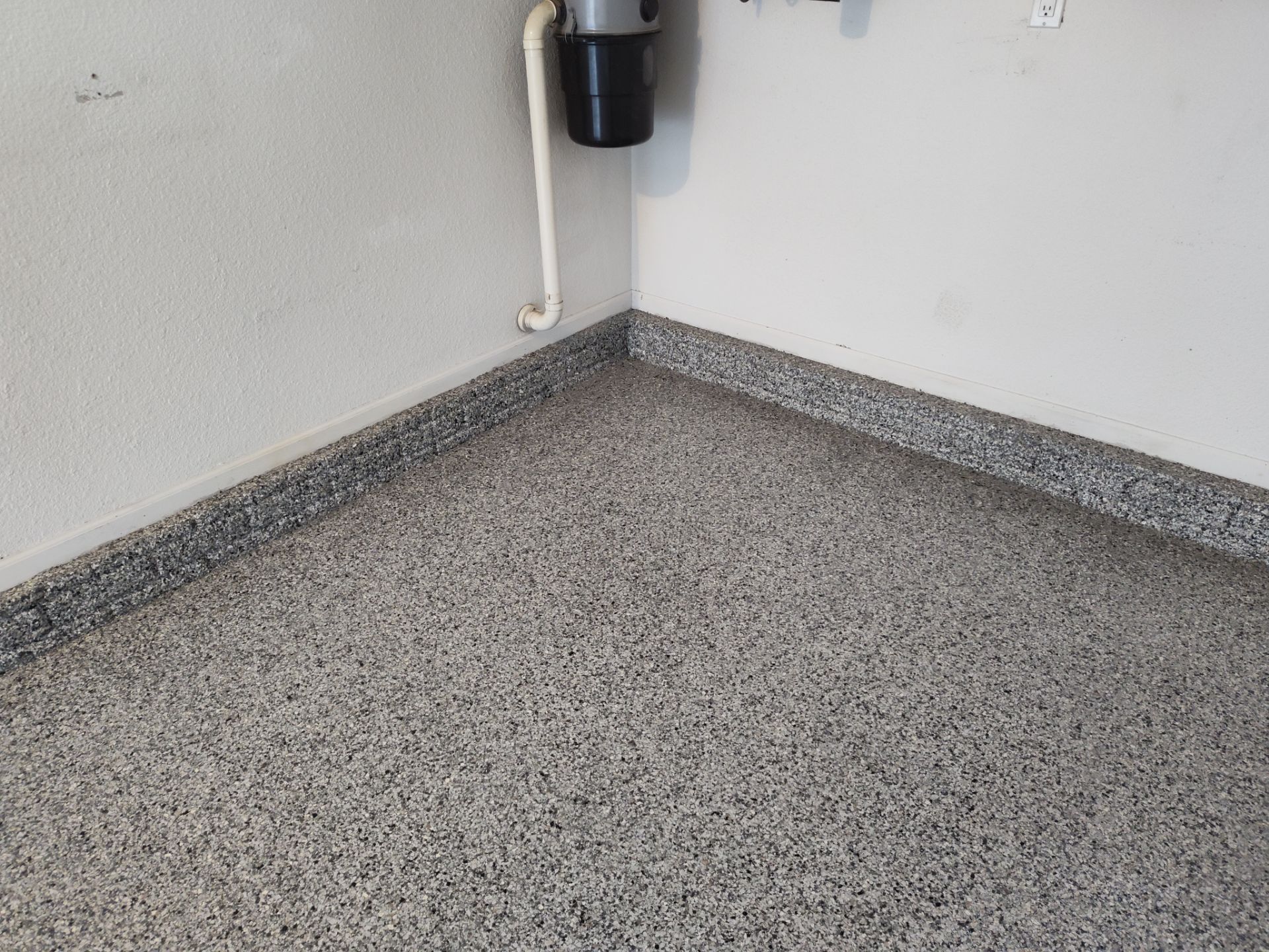 A Garage In One Day Keeps the Rock Salt Away! by Revival Concrete Coatings