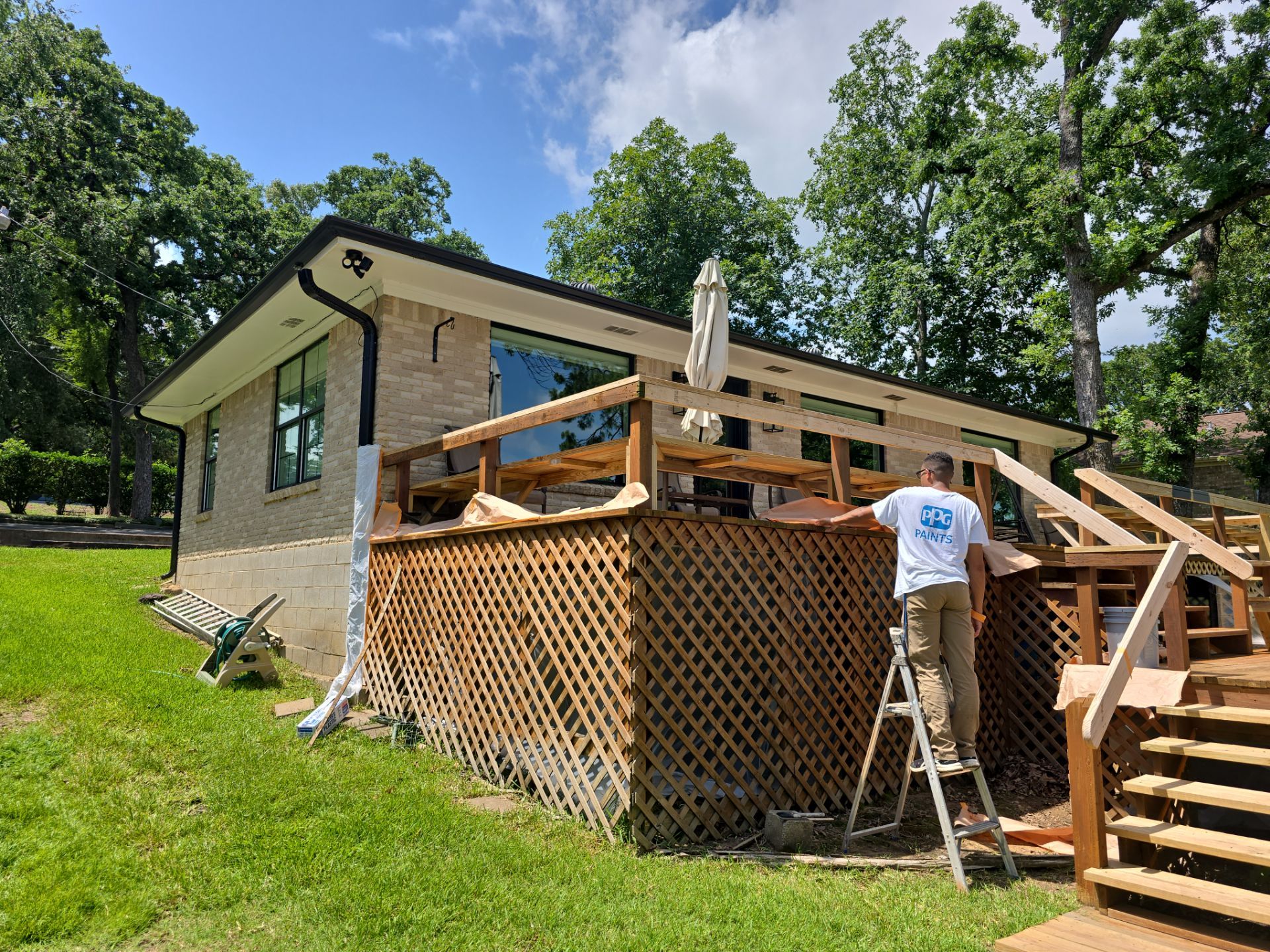Lake House Deck Restaining in Flint, Texas by Quality Coats Painting