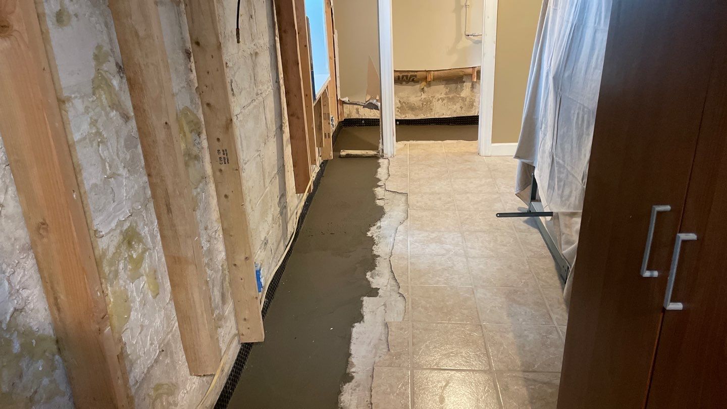 Drain Tile in Minneapolis for Kristen & Taylor by Waterproofing Northeast