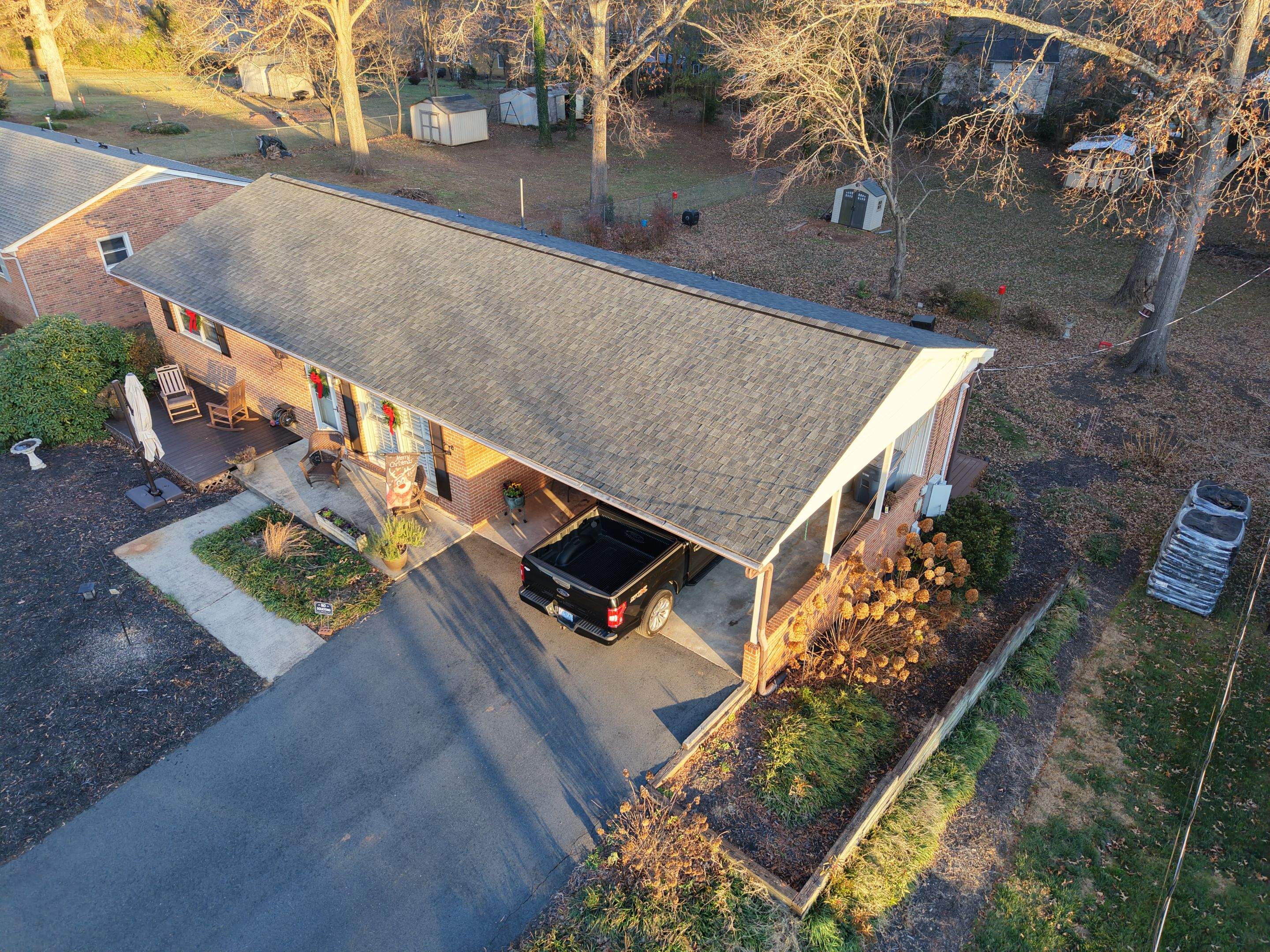 Residential Roof Replacement using TAMKO TItan XT Rustic Black by RISE Roofing & Restoration, LLC