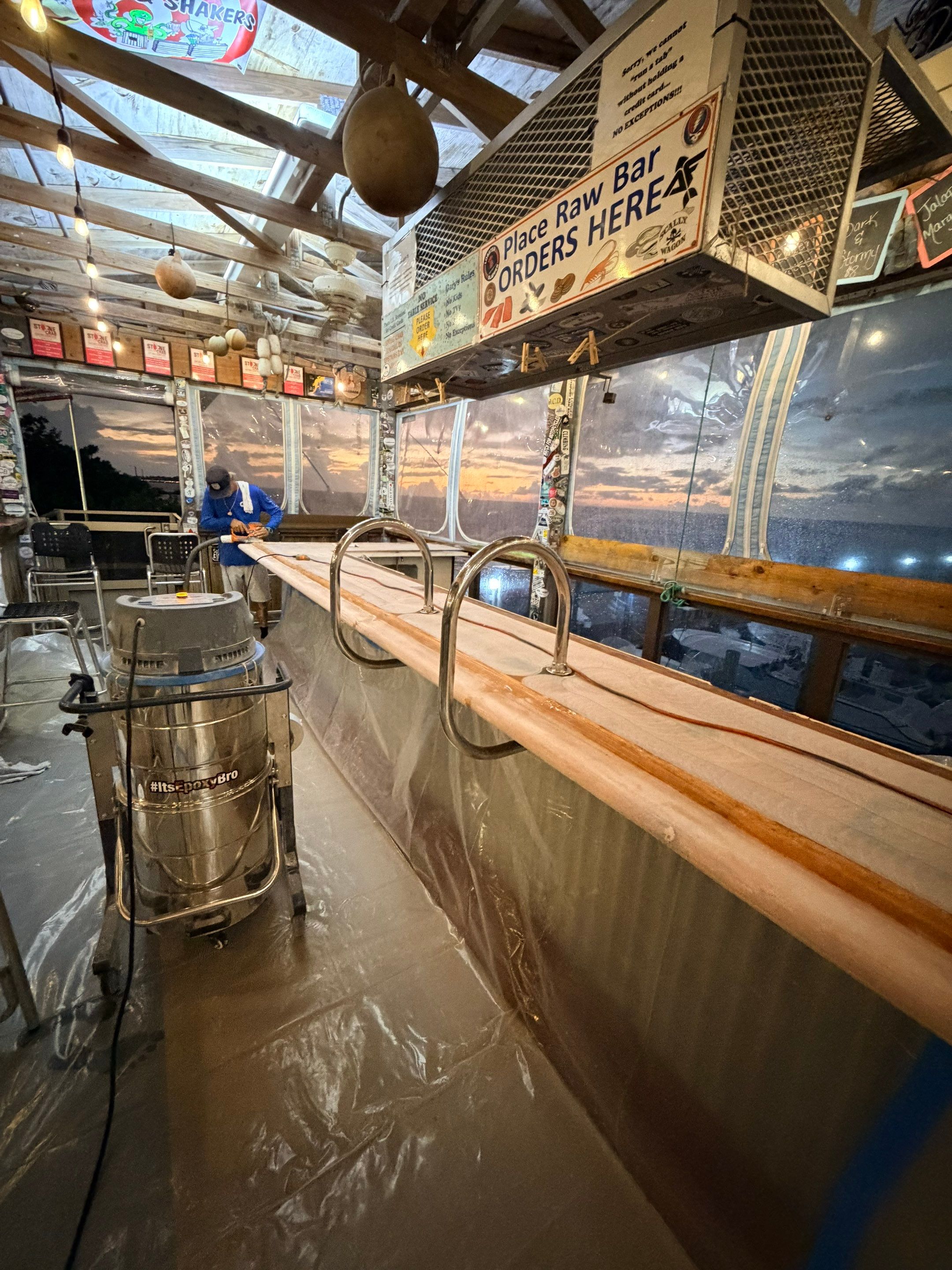 LOCAL FAMOUS FL KEYS BAR REFINISH by Tropical Epoxy Coatings & Creations LLC 