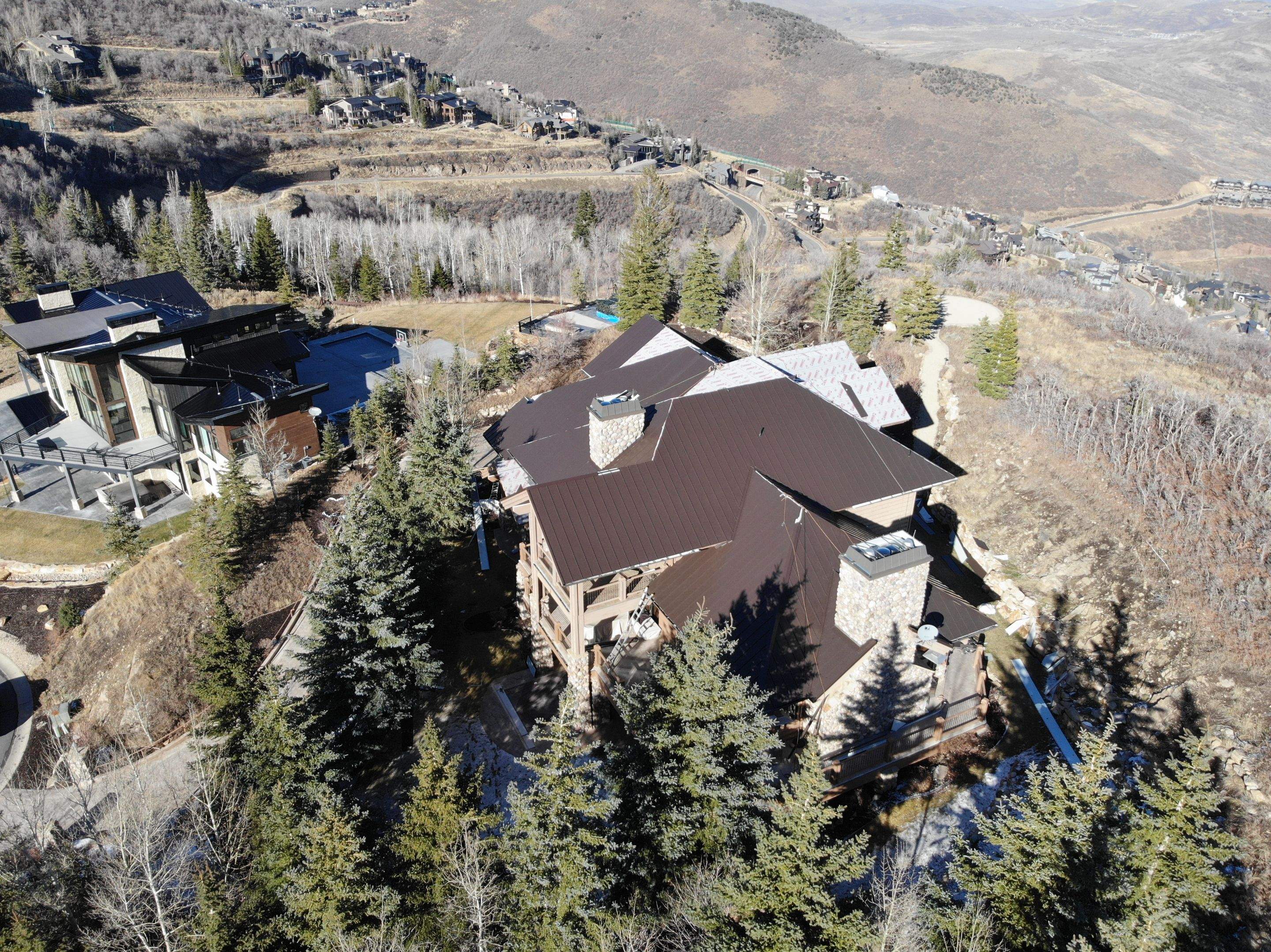 Standing Seam Metal Roof Replacement After Snow Damage by ASAP Roofing & Restoration