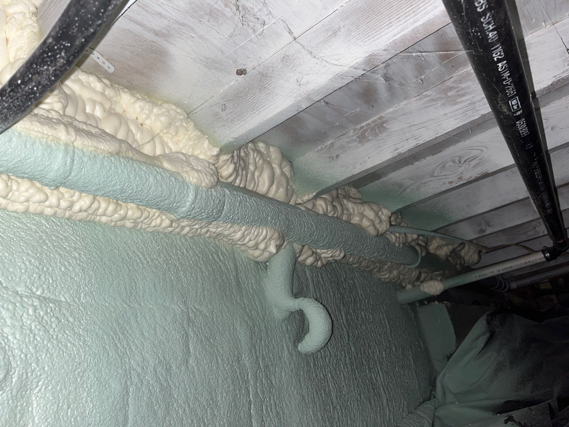 Basement Exterior Walls using Closed Cell Spray Foam by NYS Foam & Energy
