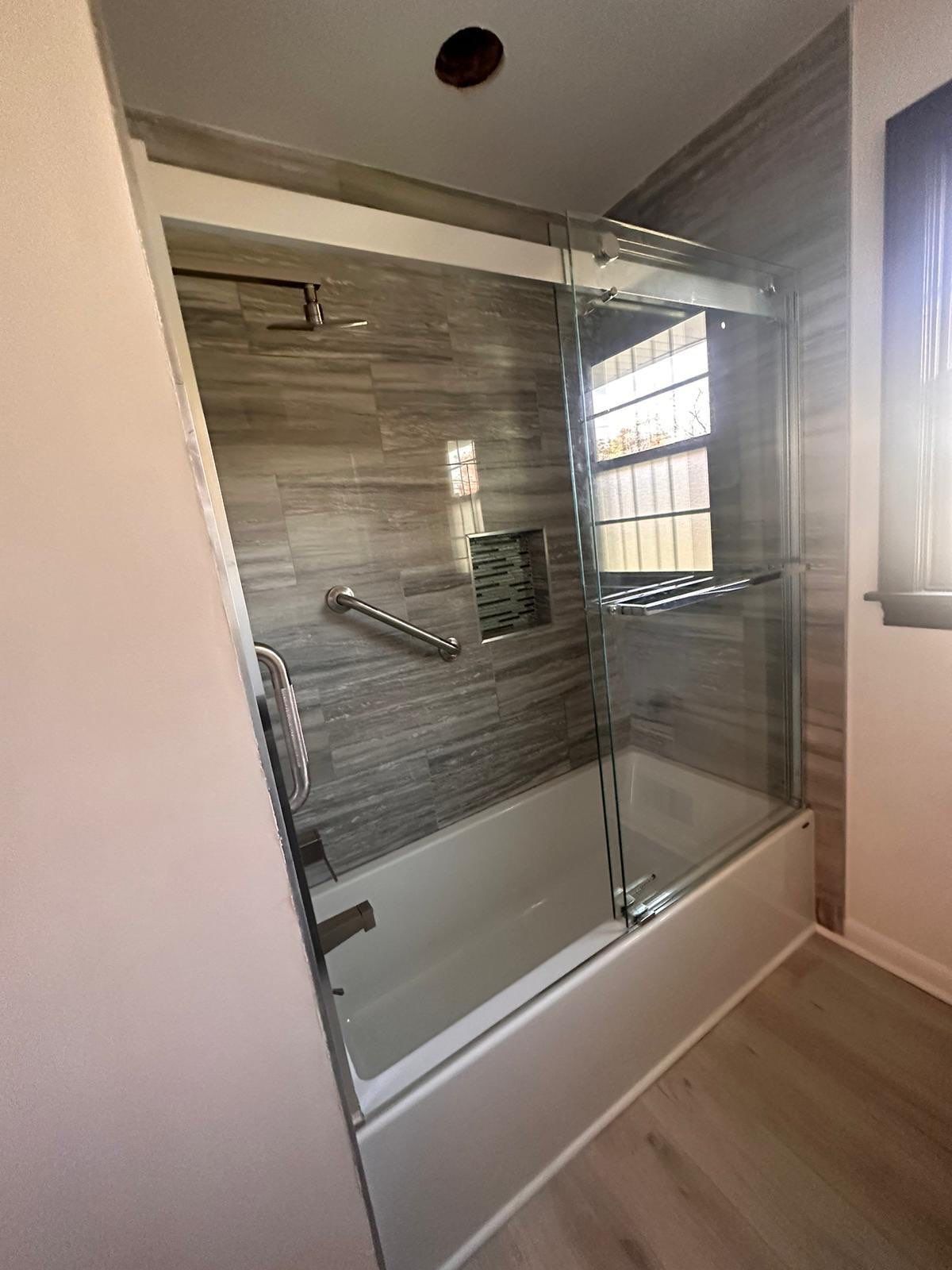 Bathroom Remodel using Tile by Home Concepts Construction