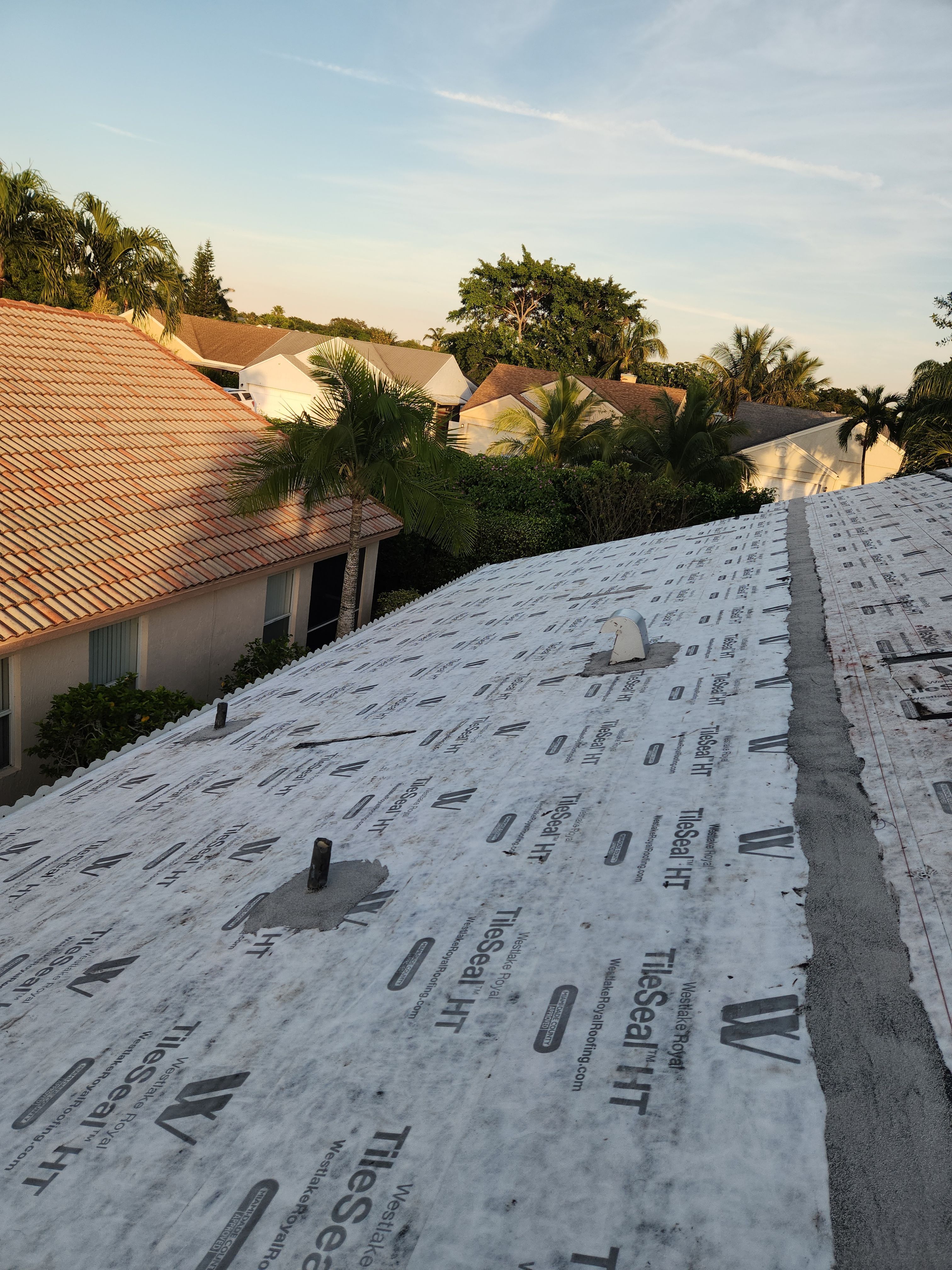 Concrete Tile Roof Replacement and Wood Decking Repair in Boca Raton by Aastro Roofing